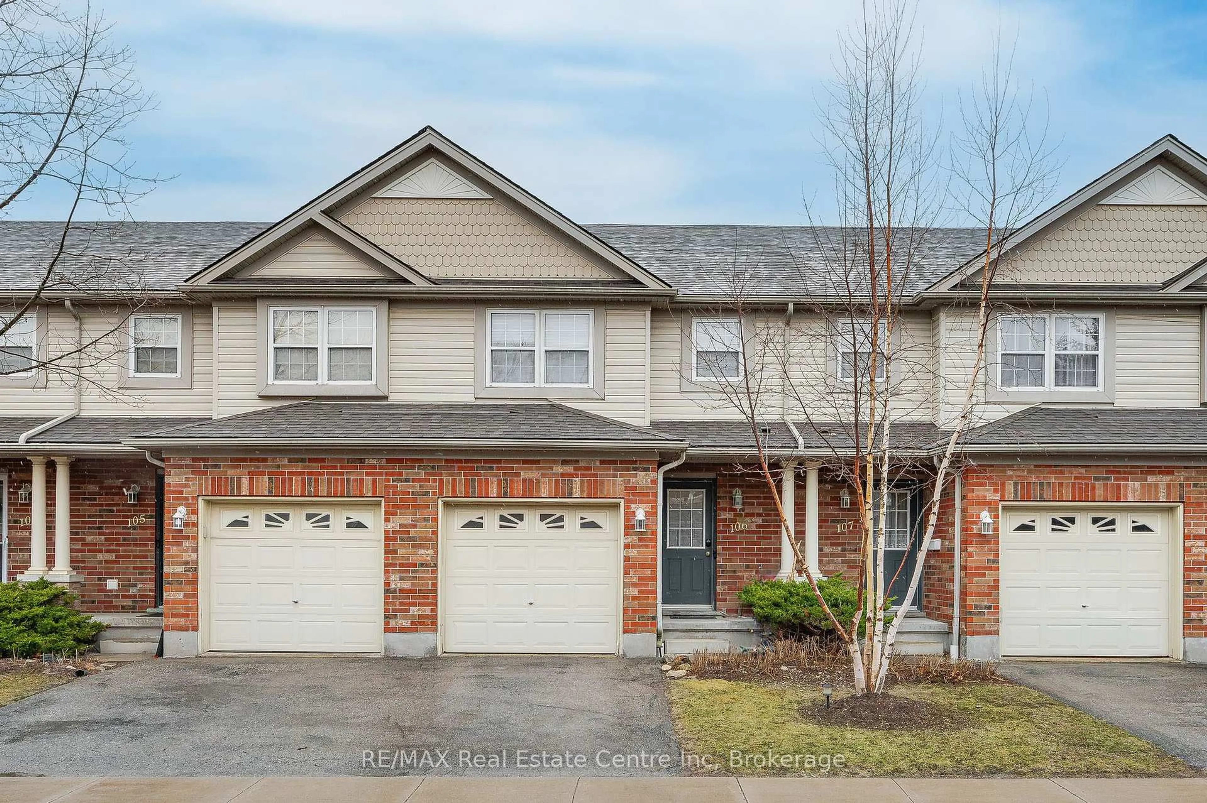 Home with brick exterior material, street for 30 IMPERIAL Rd #106, Guelph Ontario N1K 1Y1