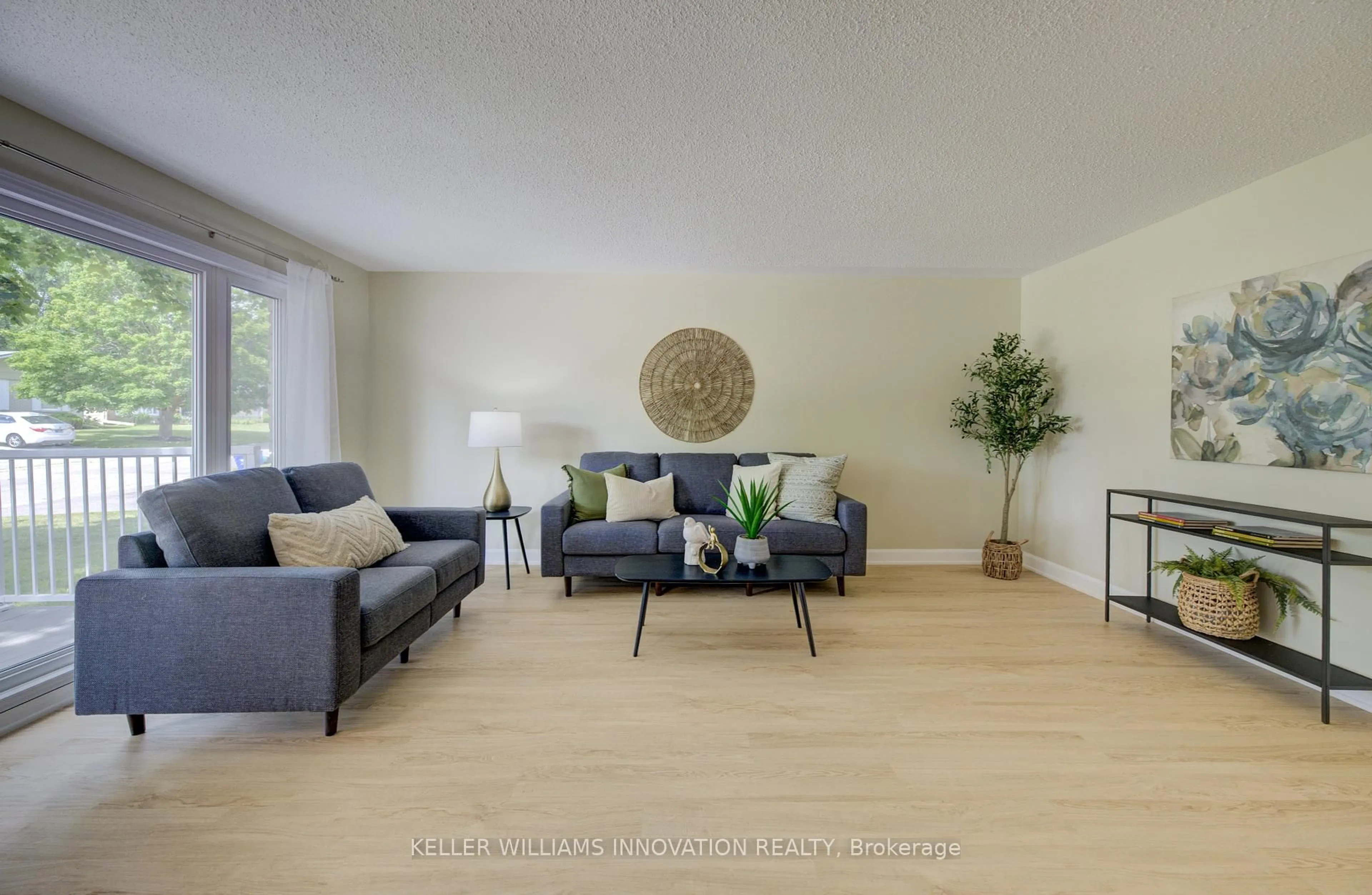Living room with furniture, wood/laminate floor for 152 Greendale Cres, Kitchener Ontario N2A 2R6