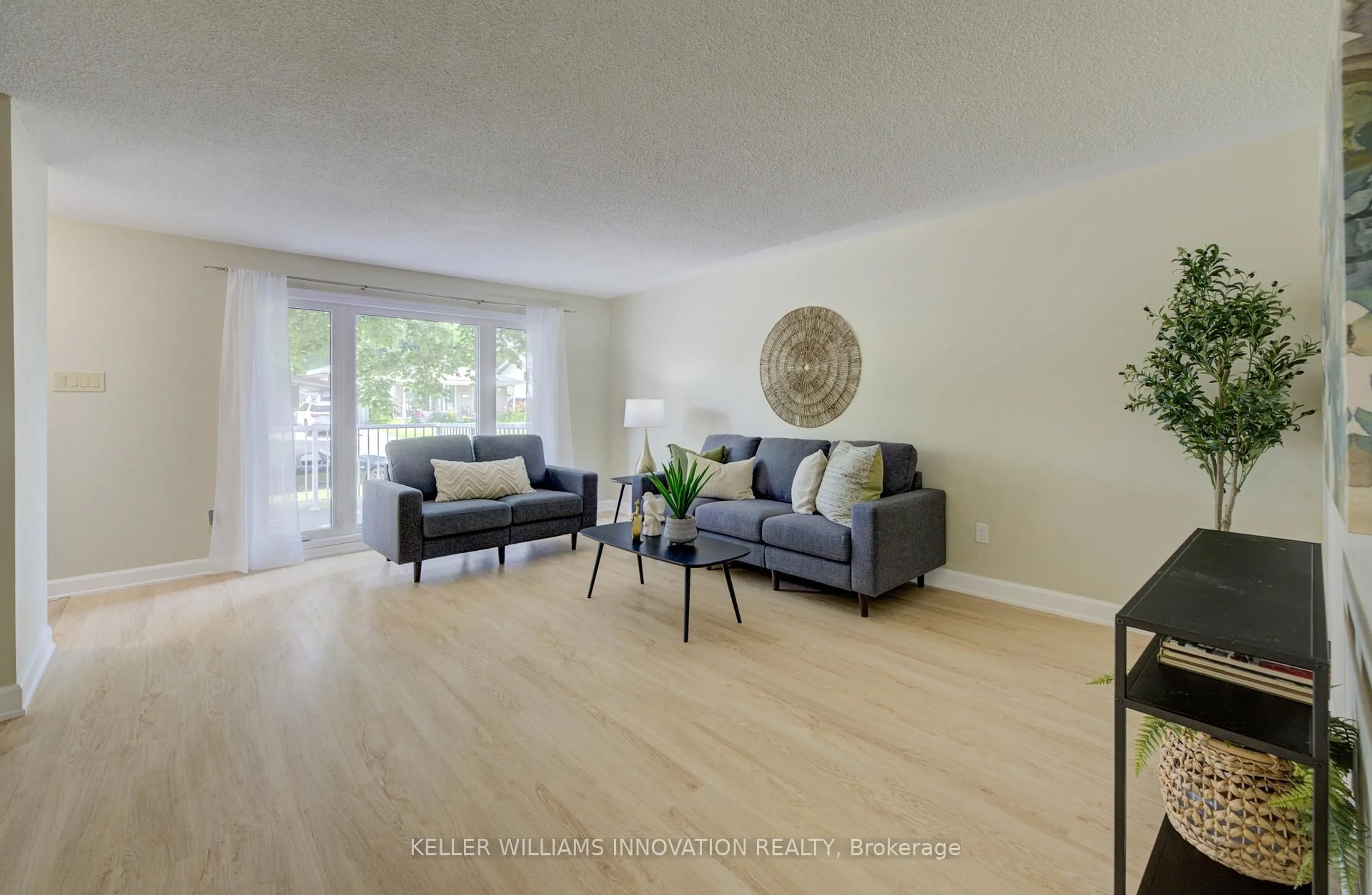 Living room with furniture, wood/laminate floor for 152 Greendale Cres, Kitchener Ontario N2A 2R6