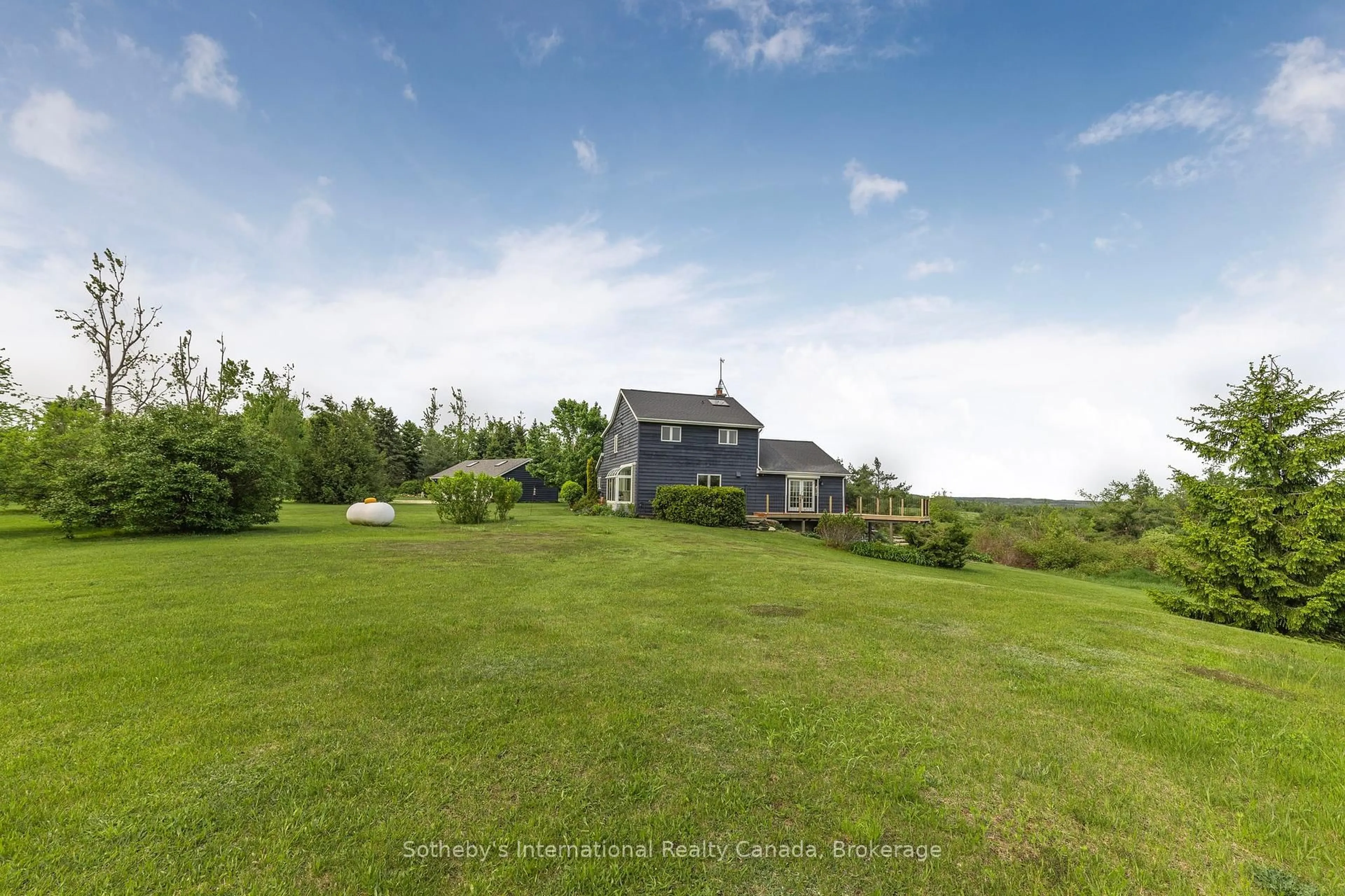 A pic from outside/outdoor area/front of a property/back of a property/a pic from drone, water/lake/river/ocean view for 758693 2nd Line, Mulmur Ontario L9V 0H1