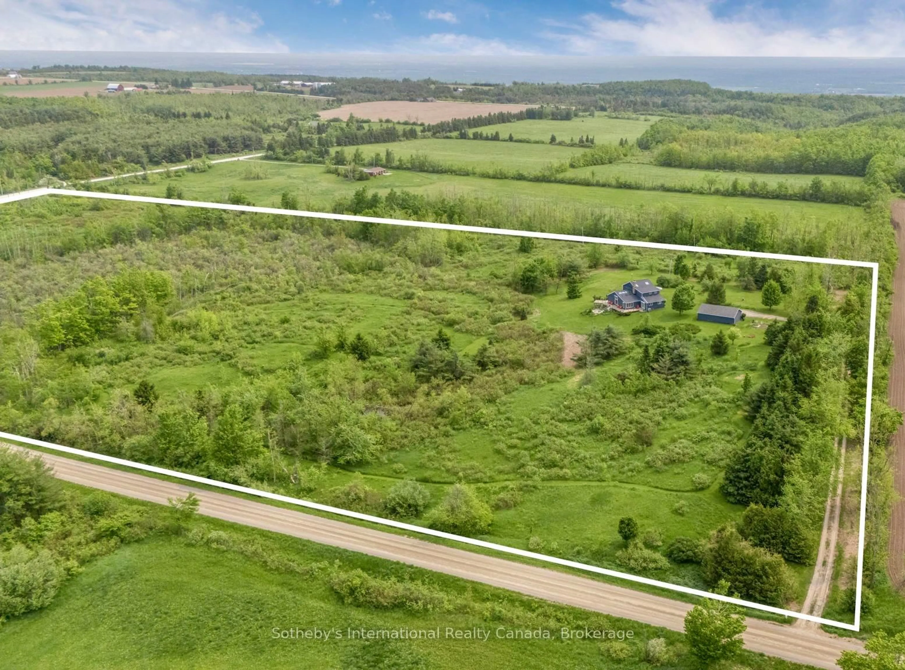 A pic from outside/outdoor area/front of a property/back of a property/a pic from drone, forest/trees view for 758693 2nd Line, Mulmur Ontario L9V 0H1