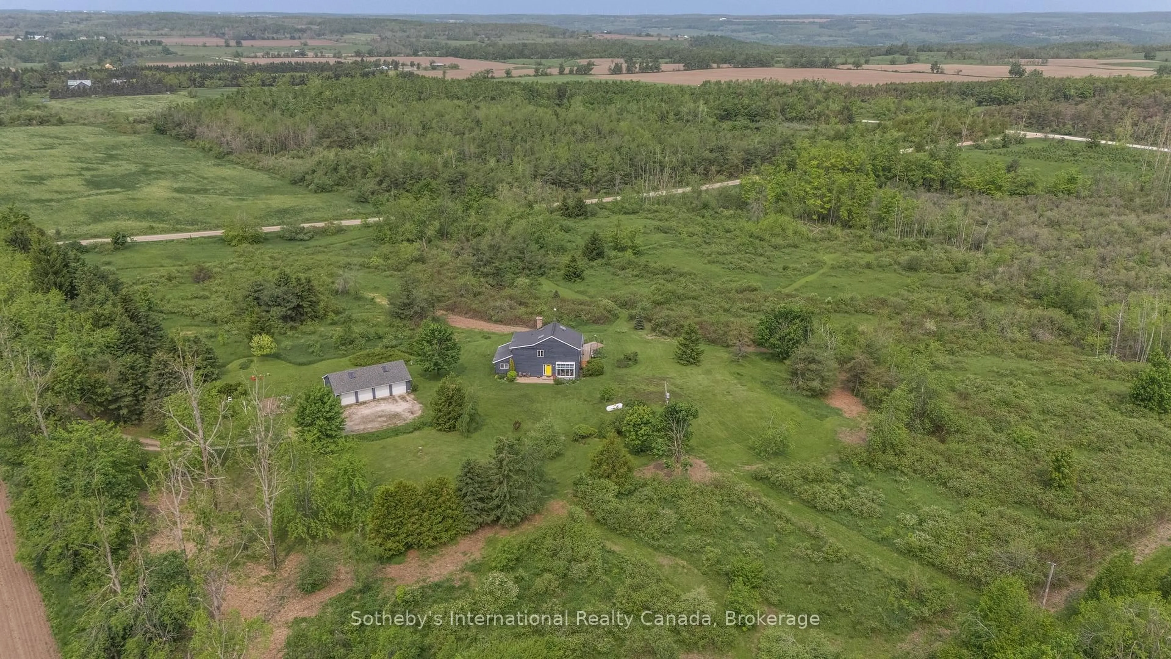 A pic from outside/outdoor area/front of a property/back of a property/a pic from drone, mountain view for 758693 2nd Line, Mulmur Ontario L9V 0H1