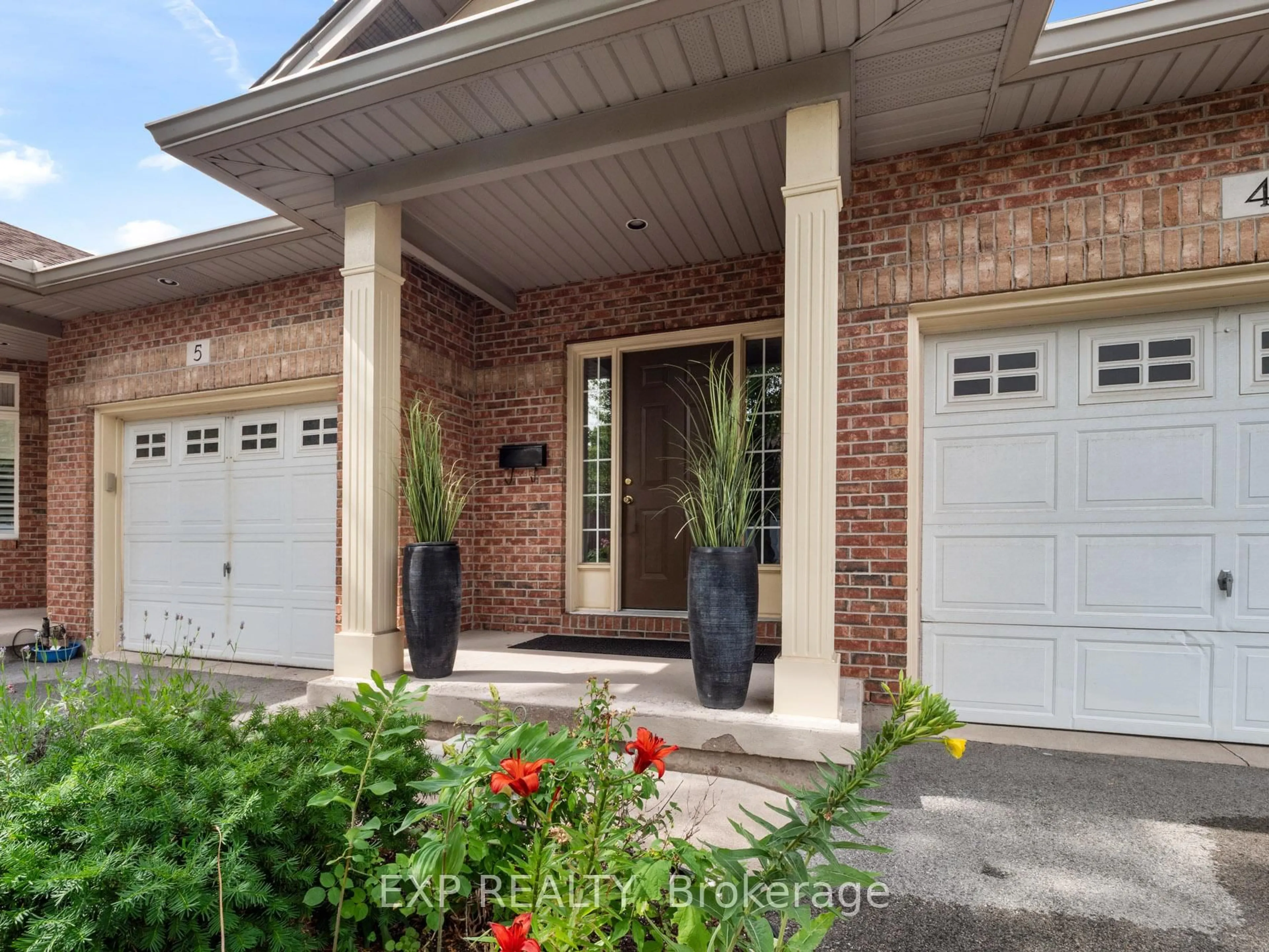 Home with brick exterior material, street for 5595 Drummond Rd #4, Niagara Falls Ontario L2G 4L2