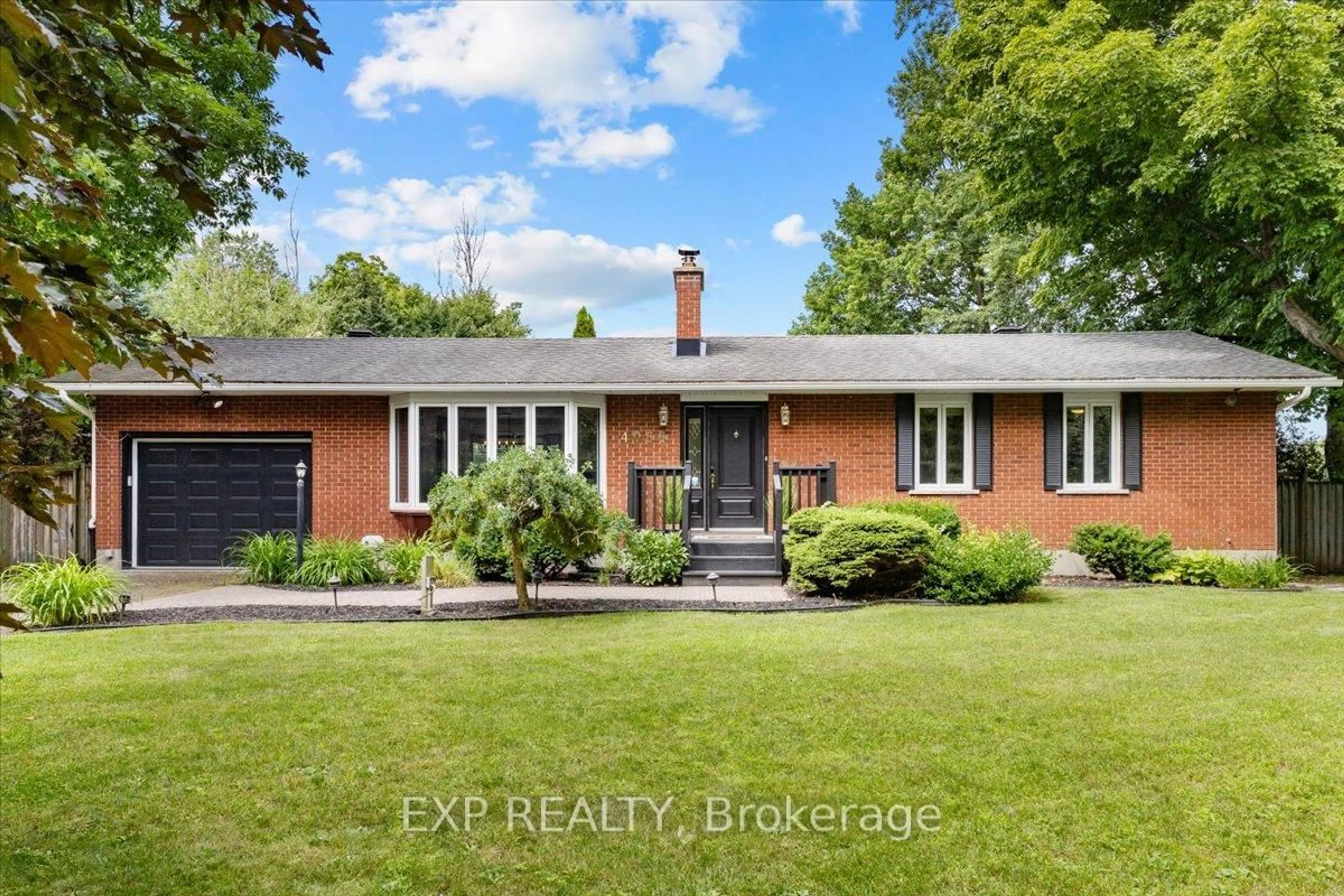 Home with brick exterior material, street for 4066 Ramsayville Rd, Ottawa Ontario K1G 3N4