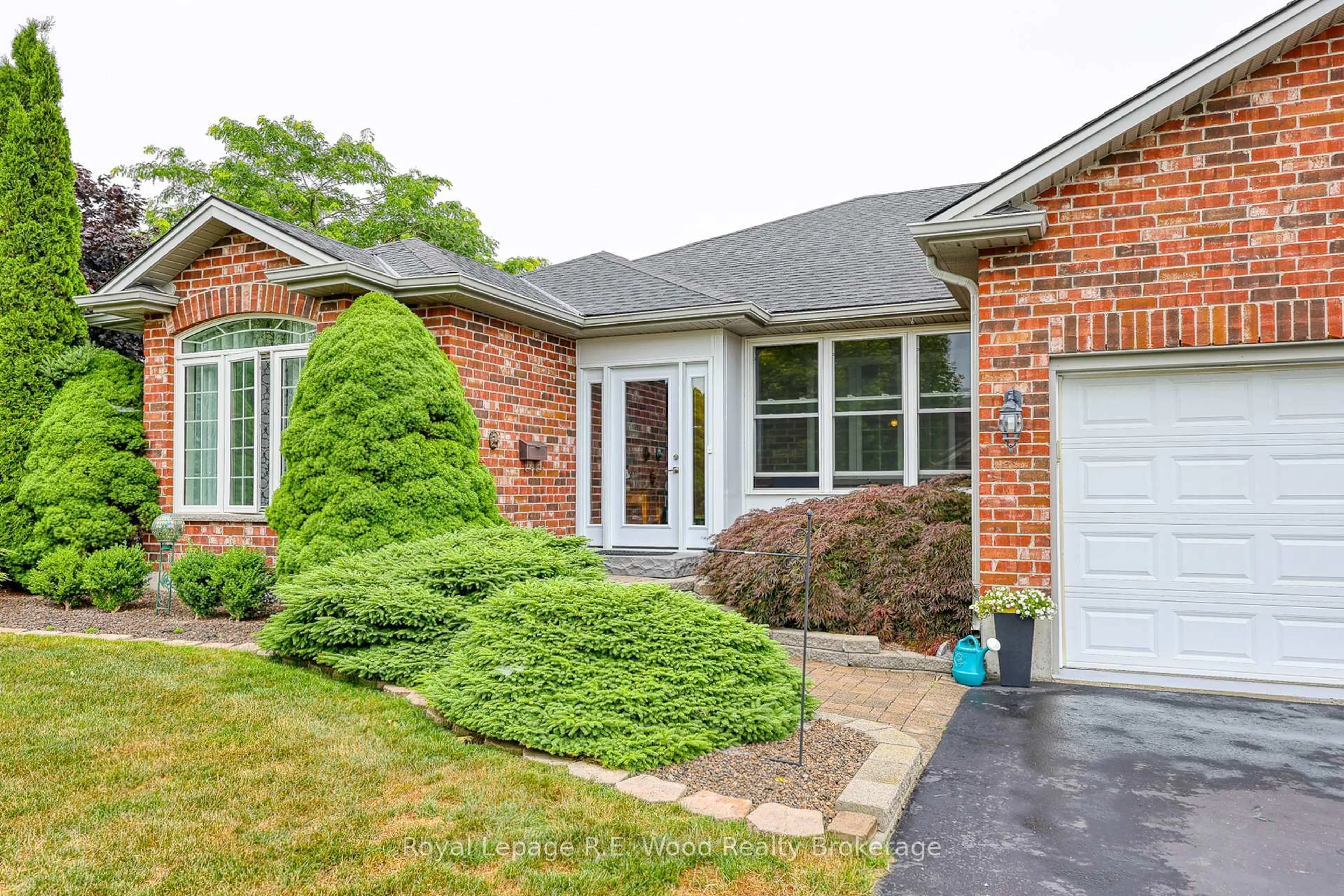 Home with brick exterior material, street for 36 Morning Glory Dr, Tillsonburg Ontario N4G 5S9