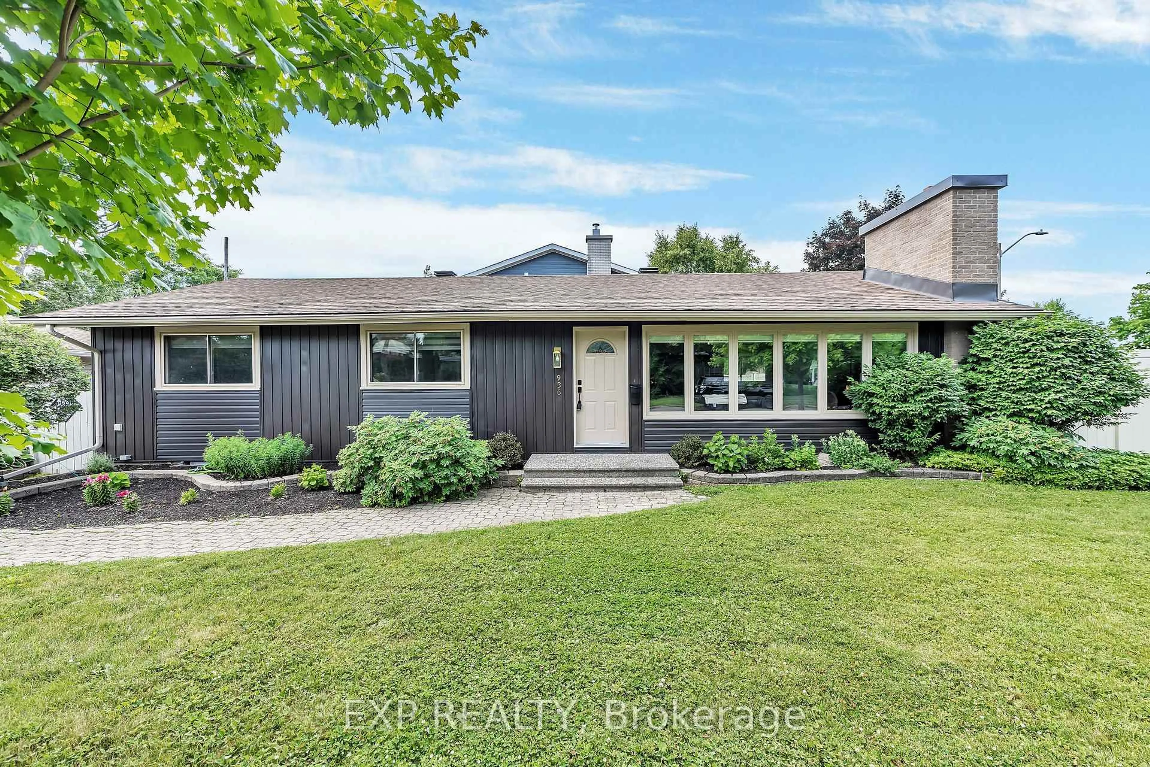 Home with vinyl exterior material, street for 936 Blythdale Rd, Ottawa Ontario K2A 3N6