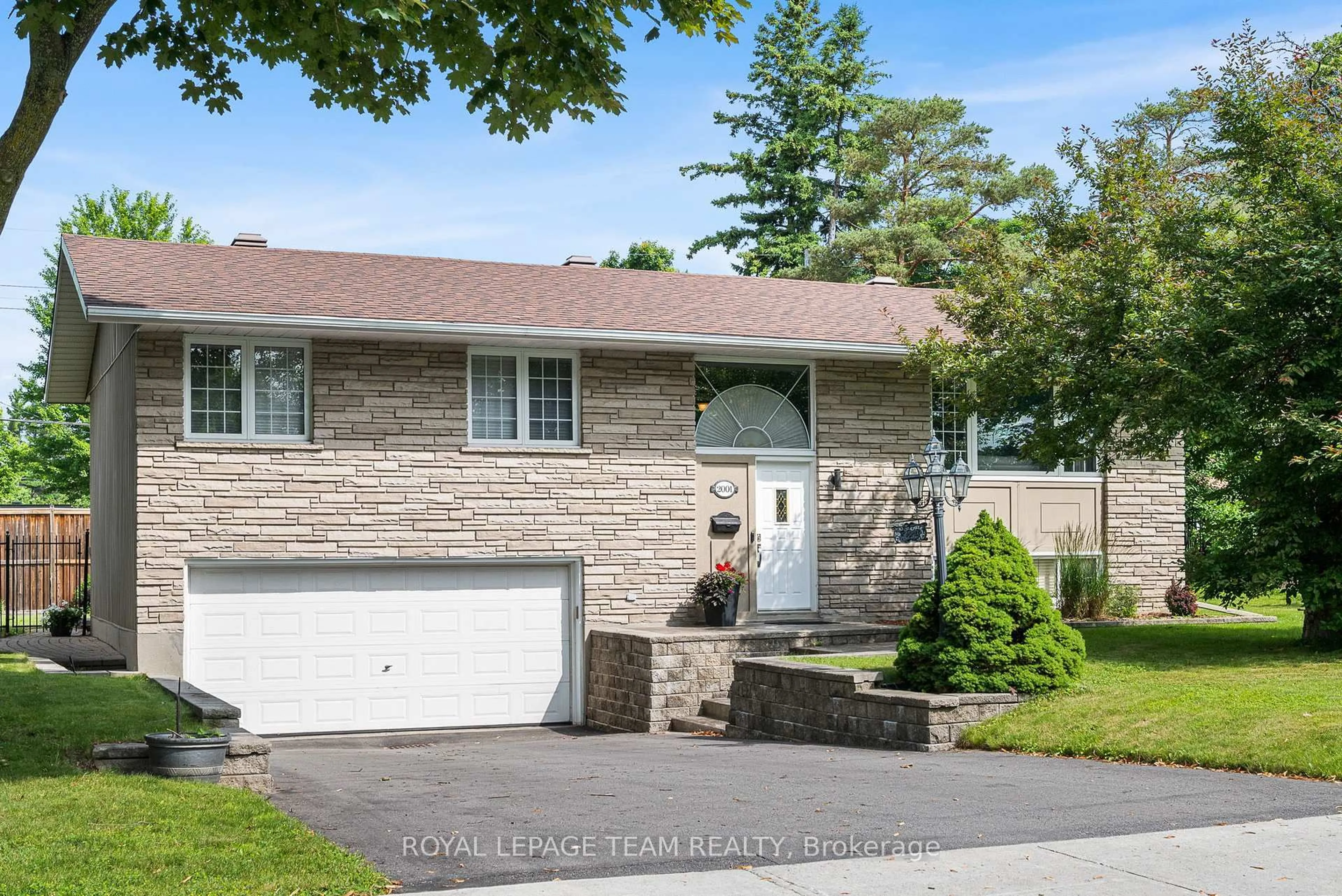 Home with brick exterior material, street for 2001 Bel-Air Dr, Ottawa Ontario K2C 0X1