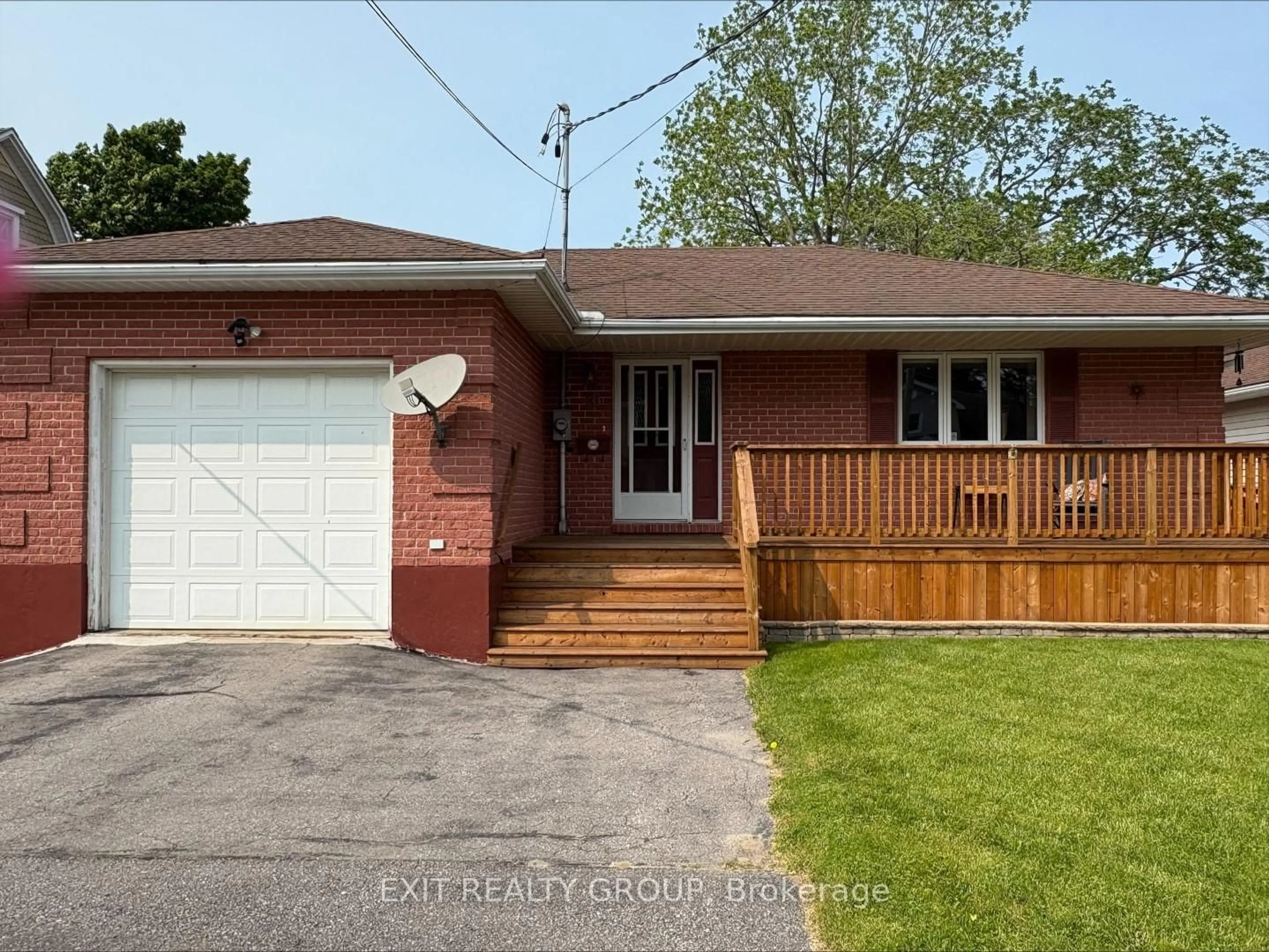 Home with brick exterior material, street for 16 Maple Ave, Prince Edward County Ontario K0K 2T0