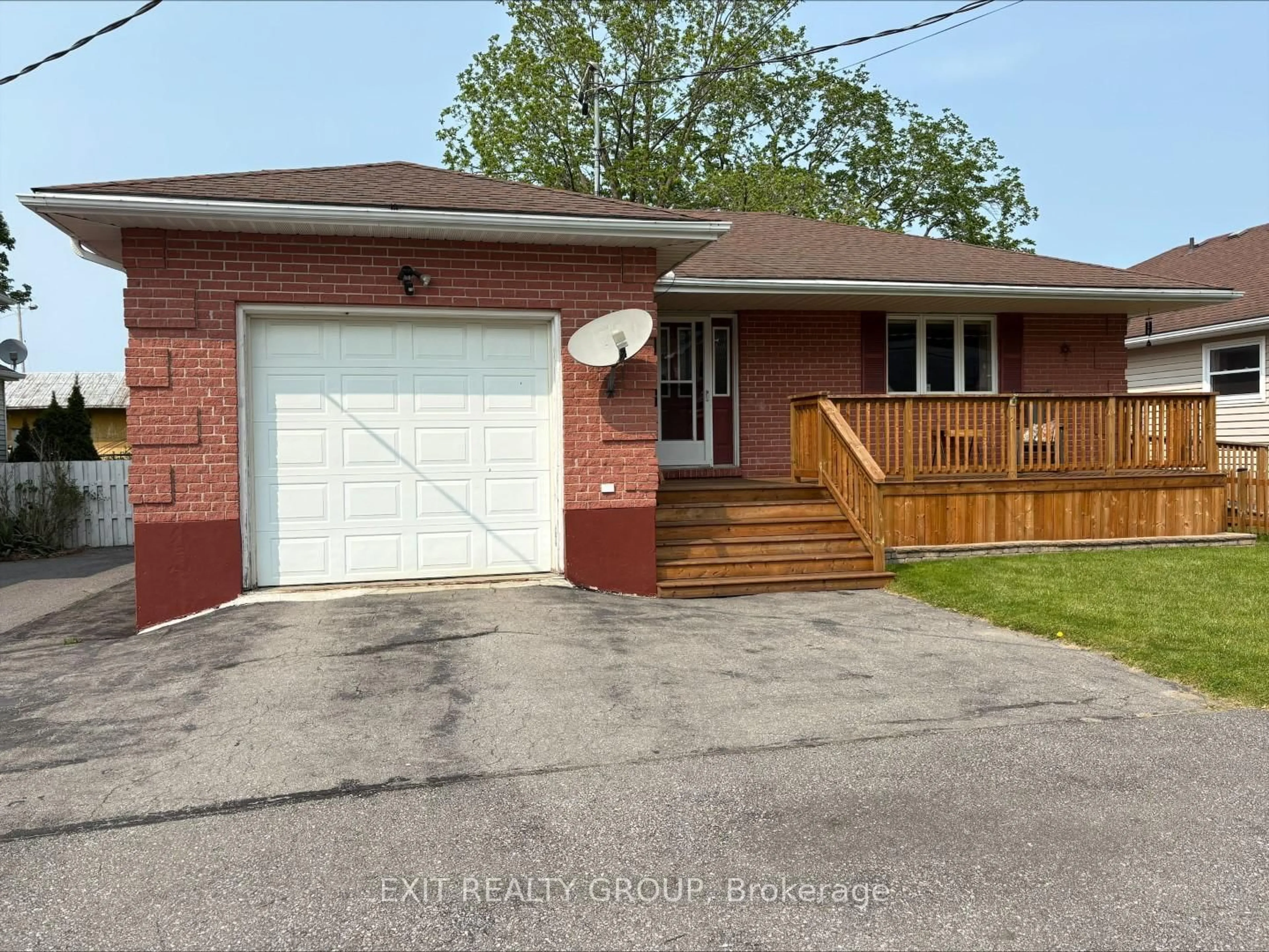 Home with brick exterior material, street for 16 Maple Ave, Prince Edward County Ontario K0K 2T0