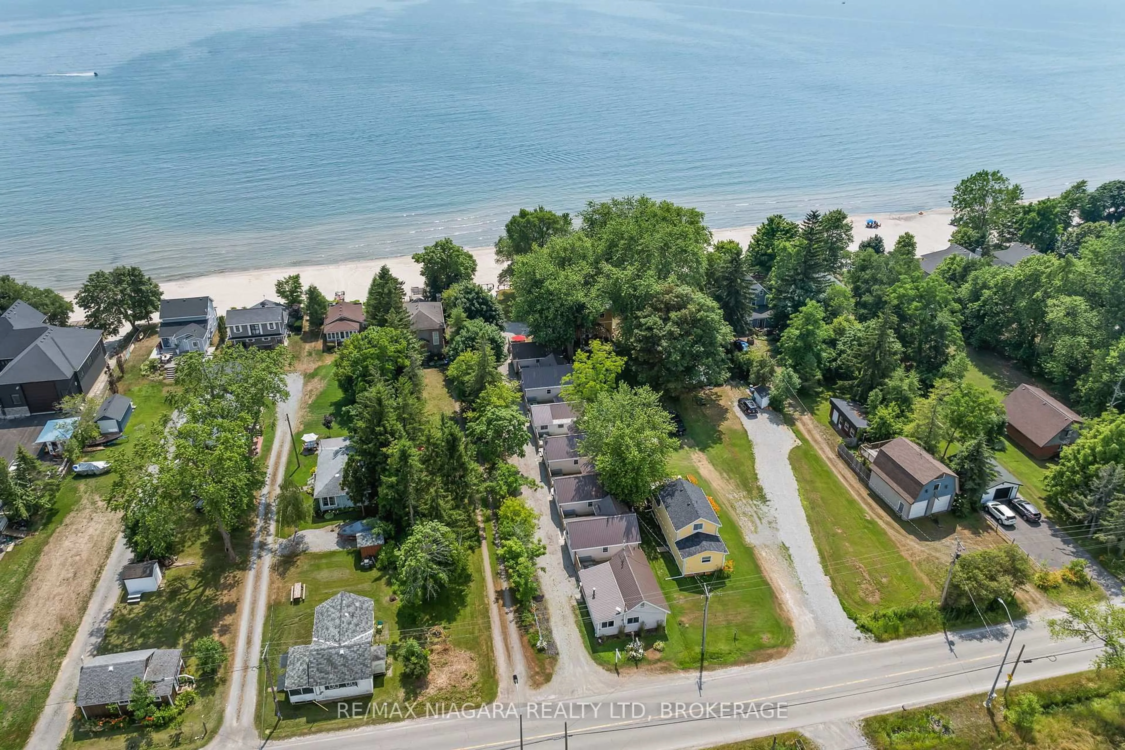 A pic from outside/outdoor area/front of a property/back of a property/a pic from drone, water/lake/river/ocean view for 12343 Lakeshore Rd, Wainfleet Ontario L0S 1V0