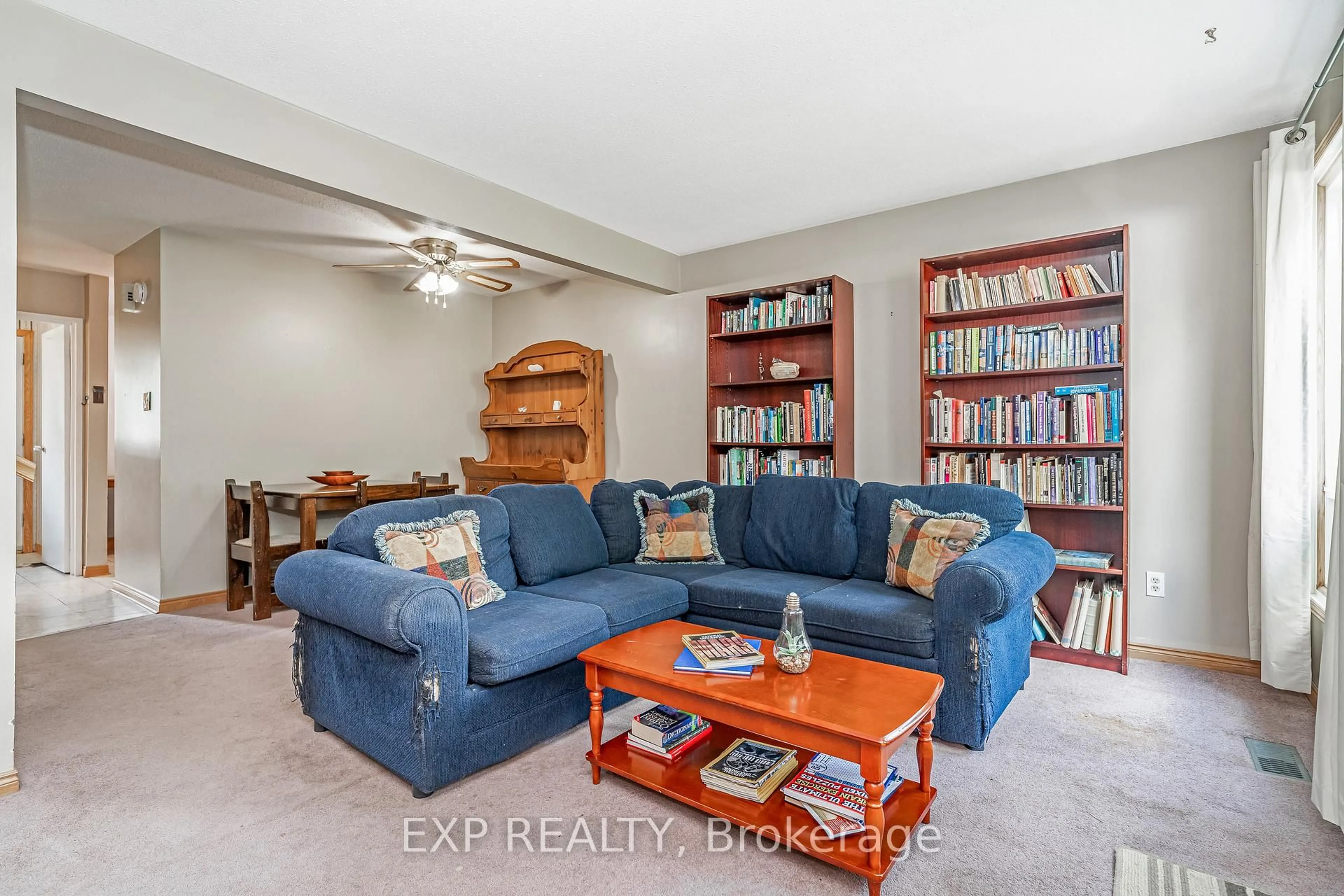Living room with furniture, unknown for 3111 Quail Dr #11, Ottawa Ontario K1T 1T9