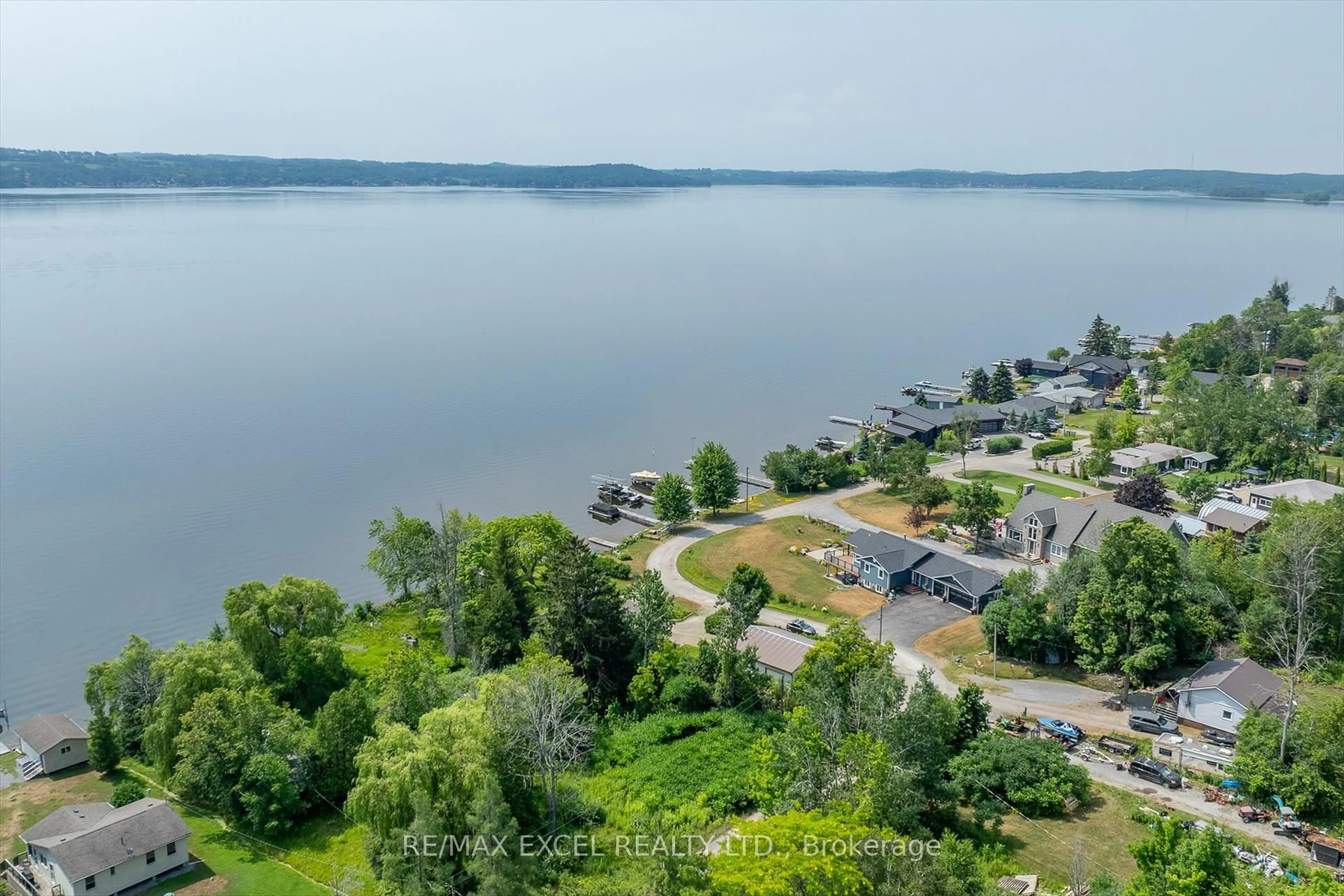 A pic from outside/outdoor area/front of a property/back of a property/a pic from drone, water/lake/river/ocean view for 665 North Shore Dr, Otonabee-South Monaghan Ontario P7B 6B3