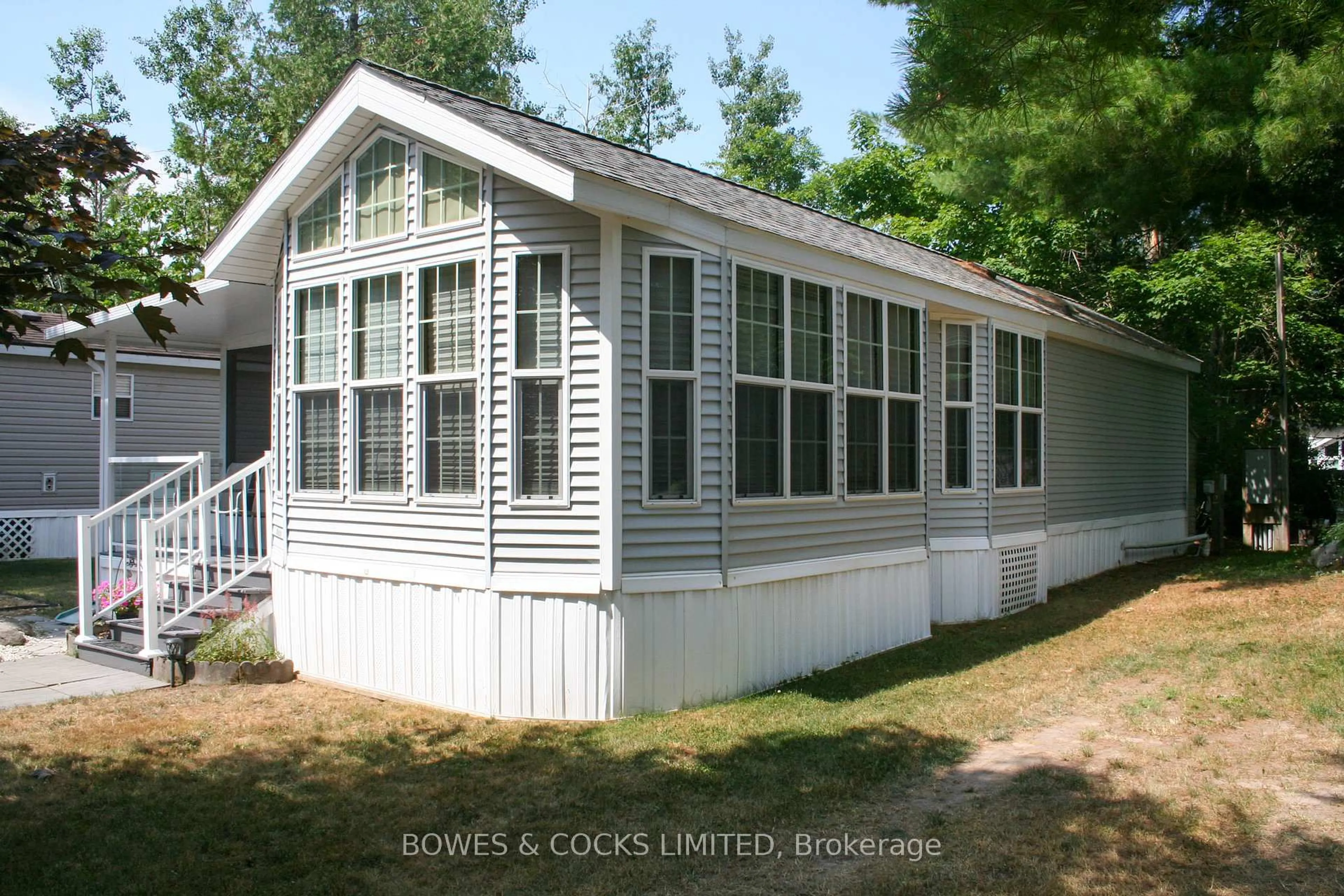 Home with vinyl exterior material, water/lake/river/ocean view for 2 Rockhaven-Pioneer Pt, Selwyn Ontario K0L 2H0