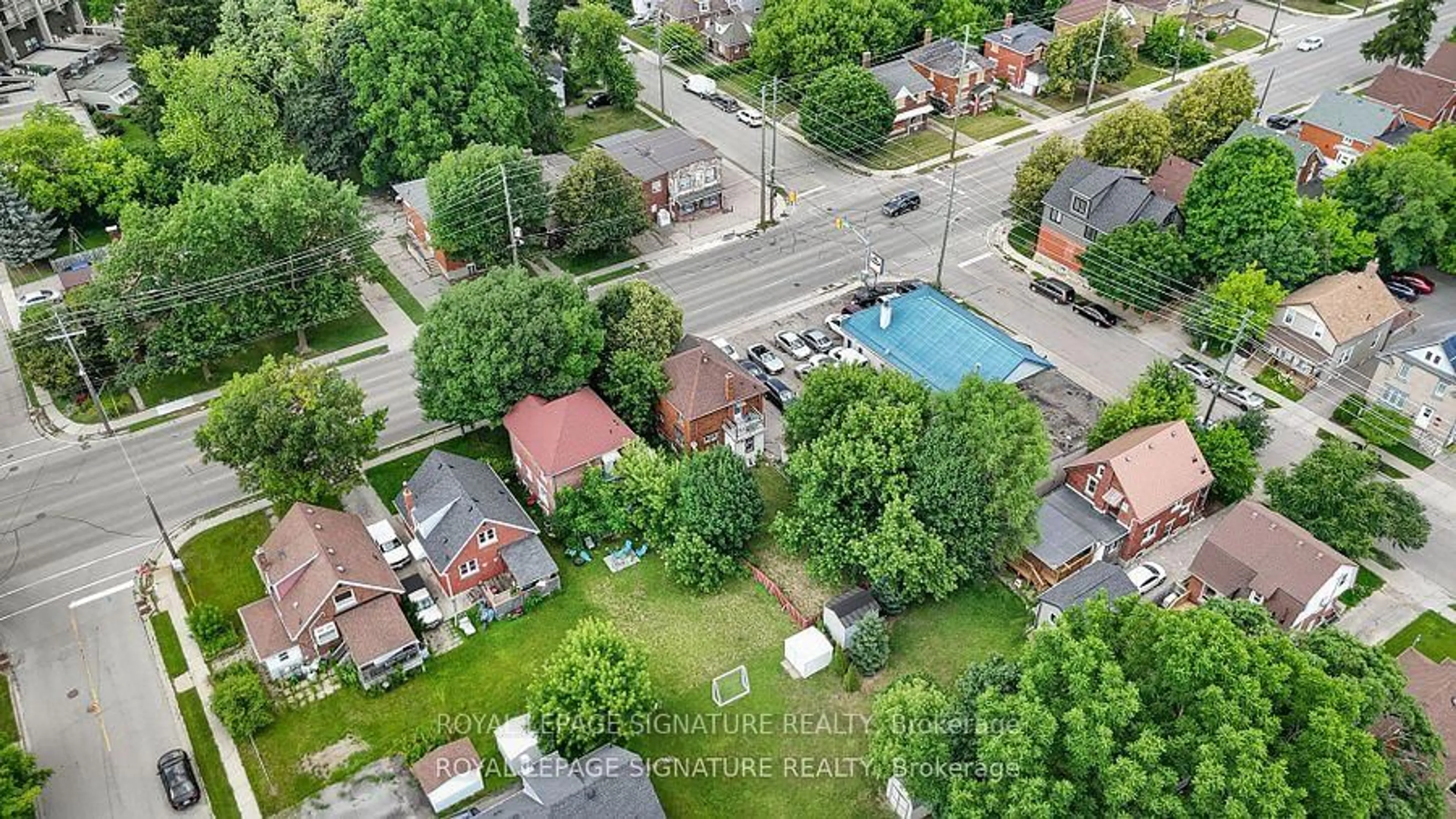 A pic from outside/outdoor area/front of a property/back of a property/a pic from drone, street for 159-165 Erb St, Waterloo Ontario N2L 1V2