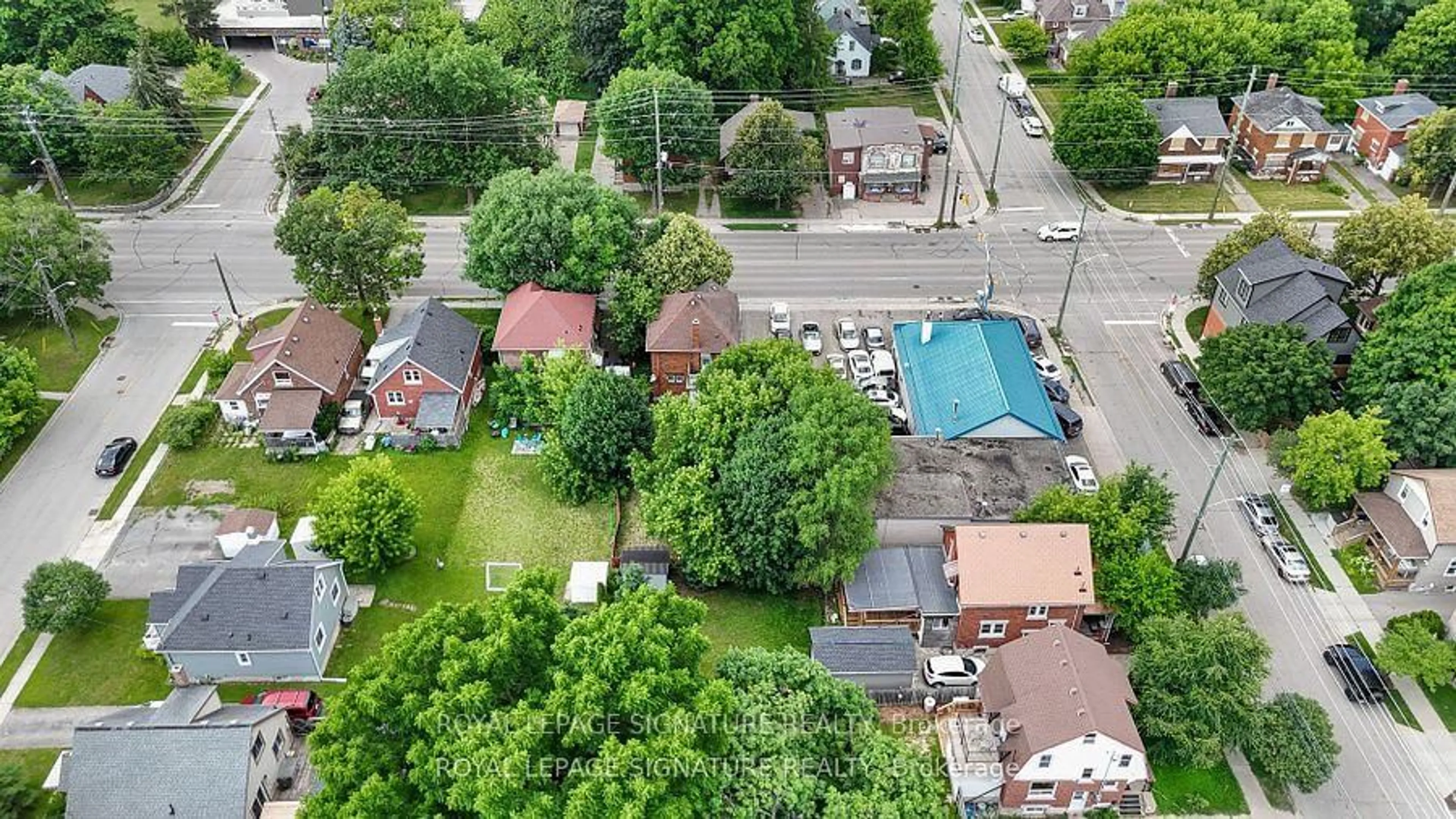 A pic from outside/outdoor area/front of a property/back of a property/a pic from drone, street for 159-165 Erb St, Waterloo Ontario N2L 1V2