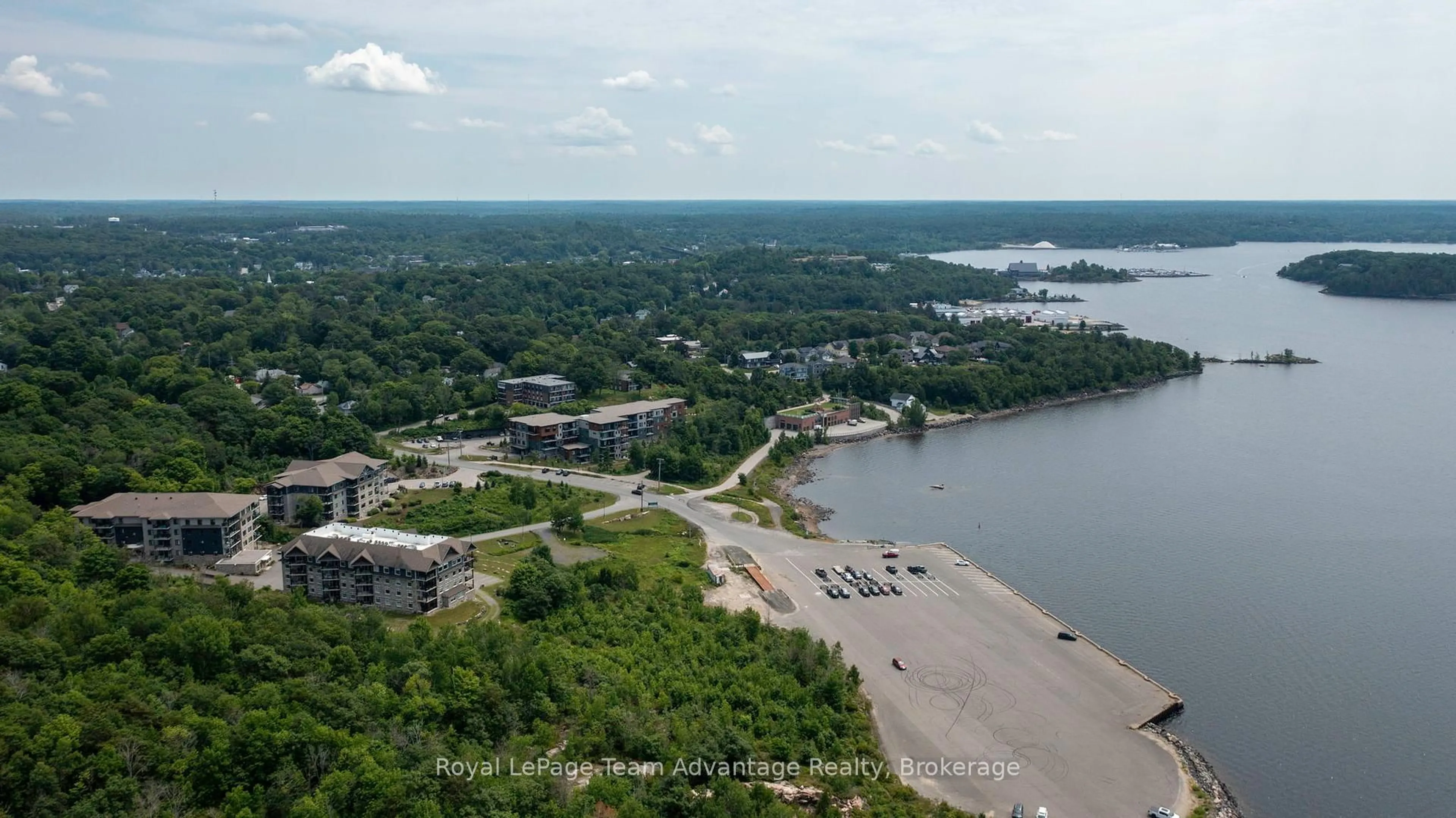 A pic from outside/outdoor area/front of a property/back of a property/a pic from drone, water/lake/river/ocean view for 11c Salt Dock Rd #108, Parry Sound Ontario P2A 3B6