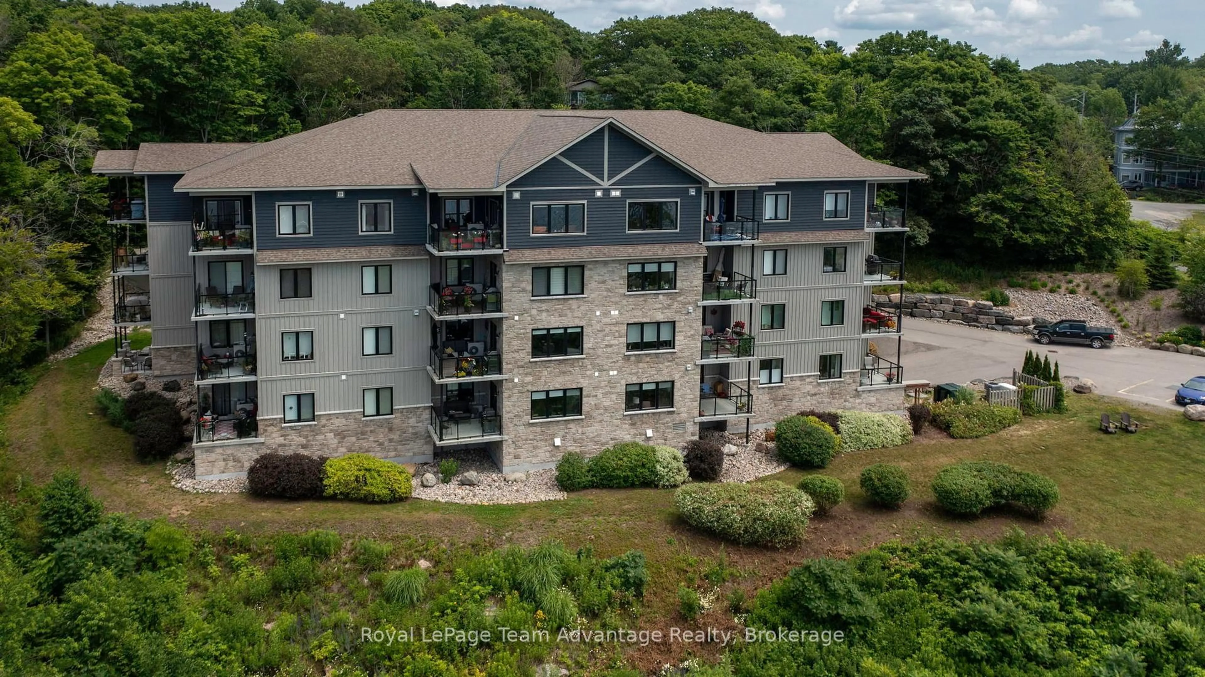 A pic from outside/outdoor area/front of a property/back of a property/a pic from drone, unknown for 11c Salt Dock Rd #108, Parry Sound Ontario P2A 3B6