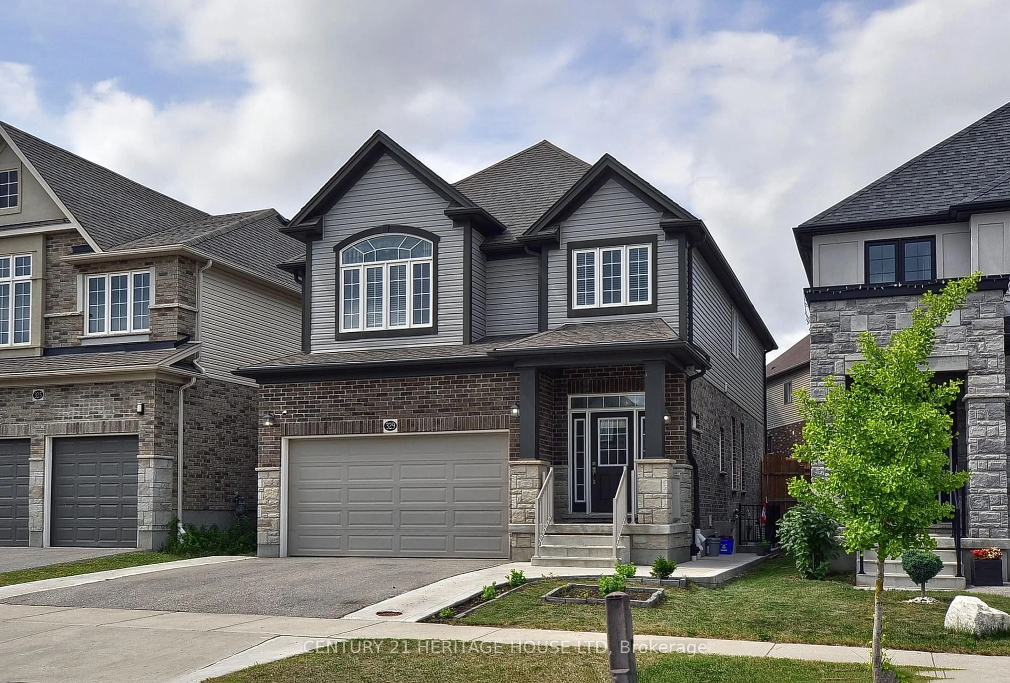 Home with brick exterior material, street for 329 Sedgewood St, Kitchener Ontario N2P 0H9