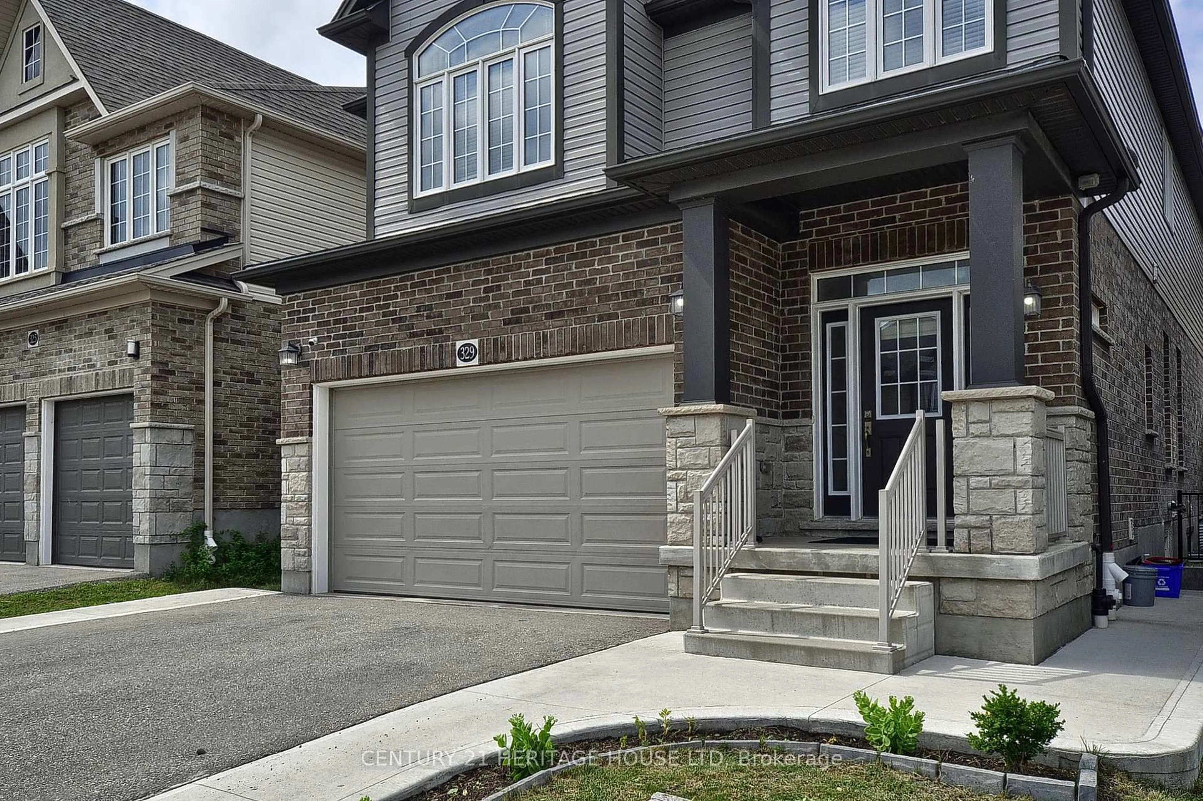 Home with brick exterior material, street for 329 Sedgewood St, Kitchener Ontario N2P 0H9