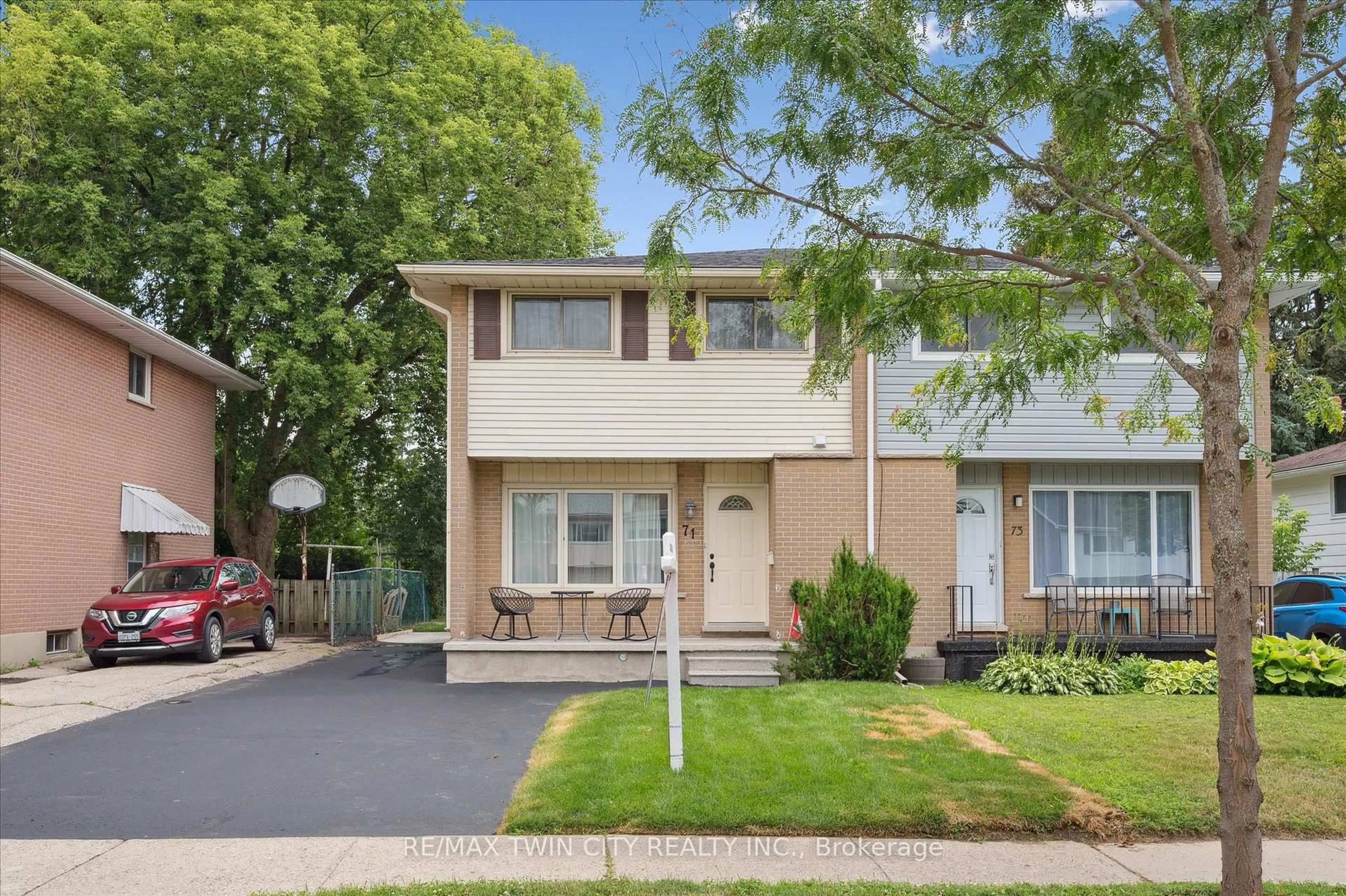 Home with vinyl exterior material, street for 71 Overlea Dr, Kitchener Ontario N2M 1S9