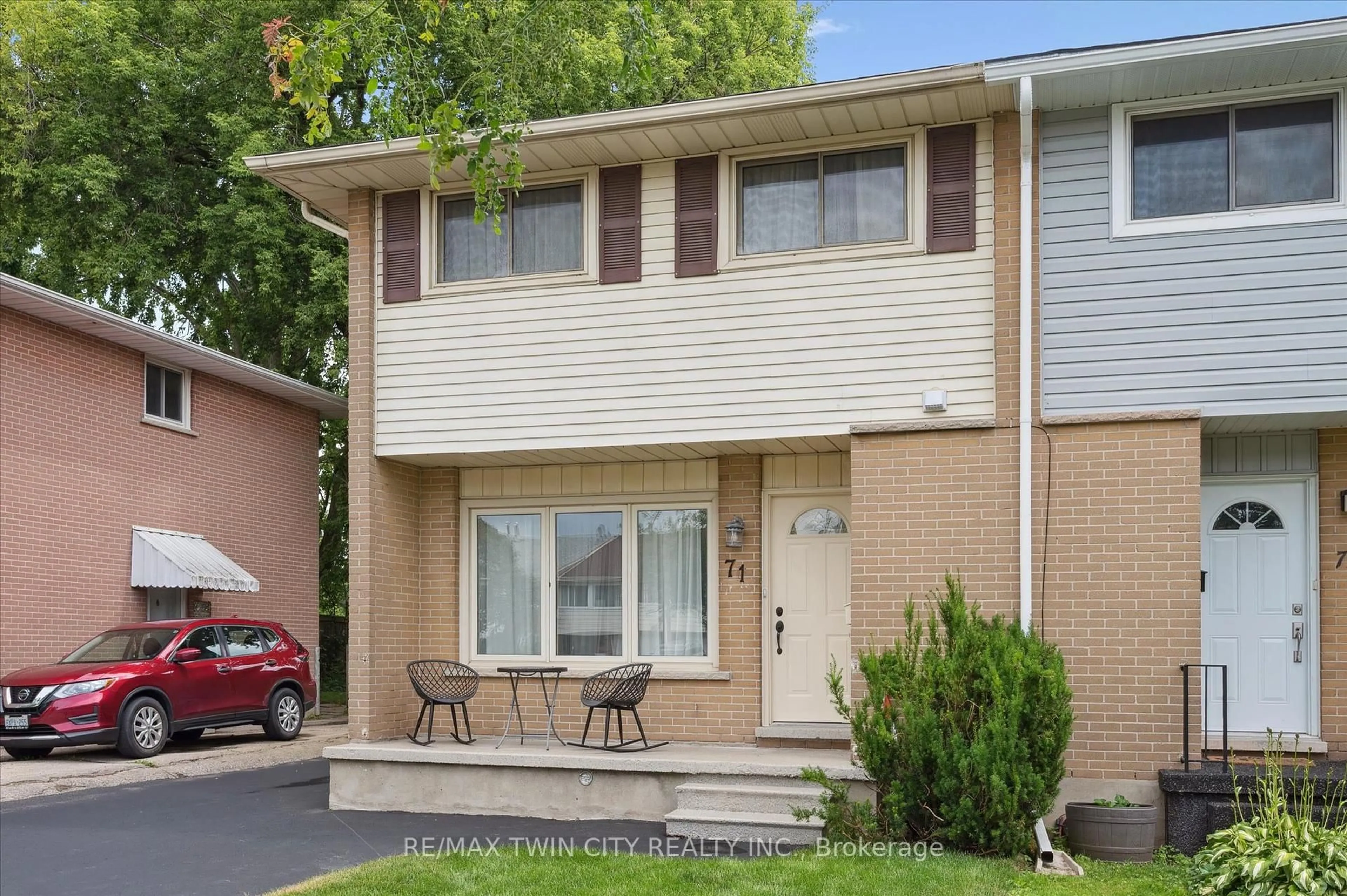 Home with vinyl exterior material, street for 71 Overlea Dr, Kitchener Ontario N2M 1S9