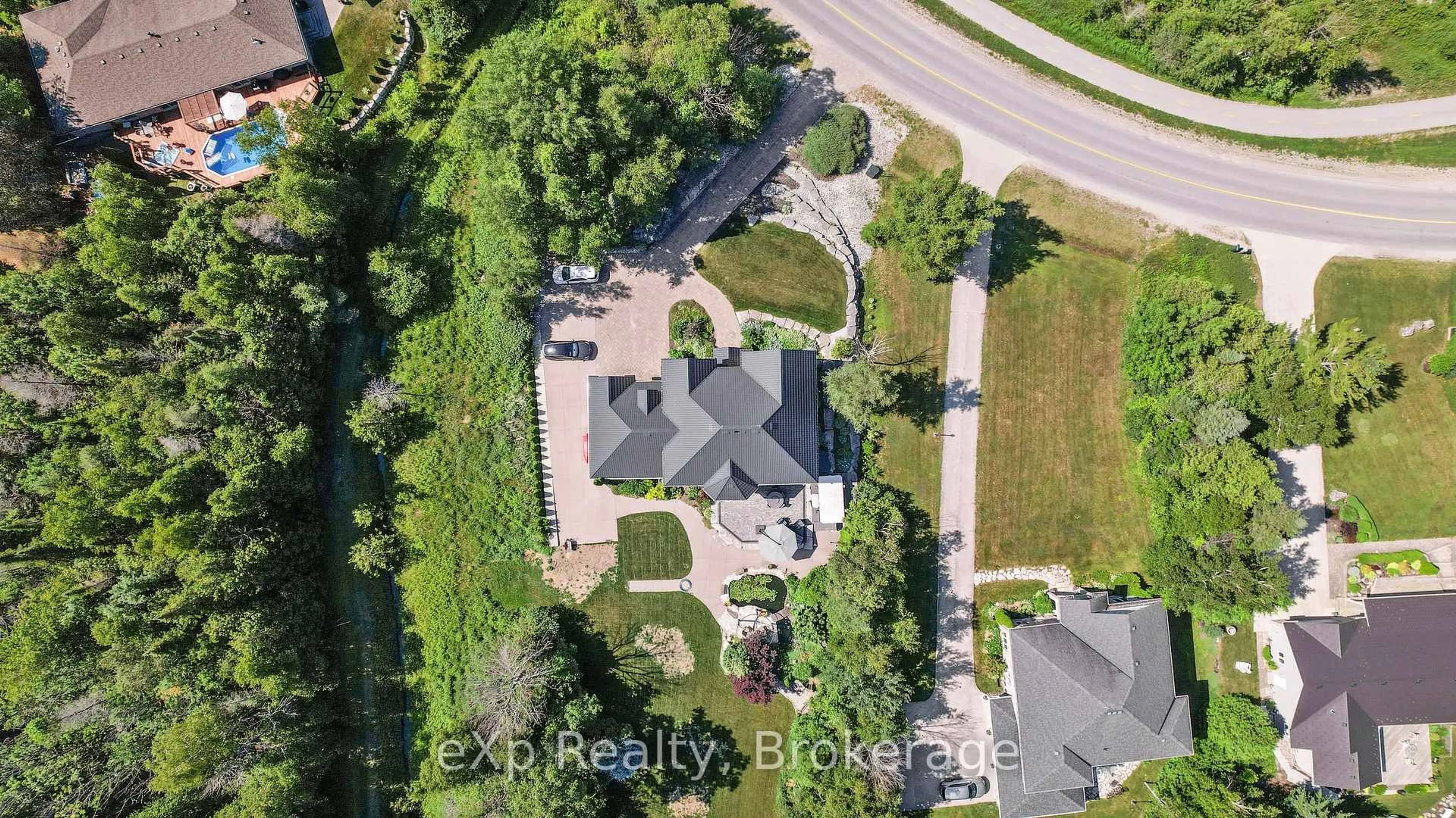 A pic from outside/outdoor area/front of a property/back of a property/a pic from drone, street for 56 Miramichi Bay Rd, Saugeen Shores Ontario N0H 2C0