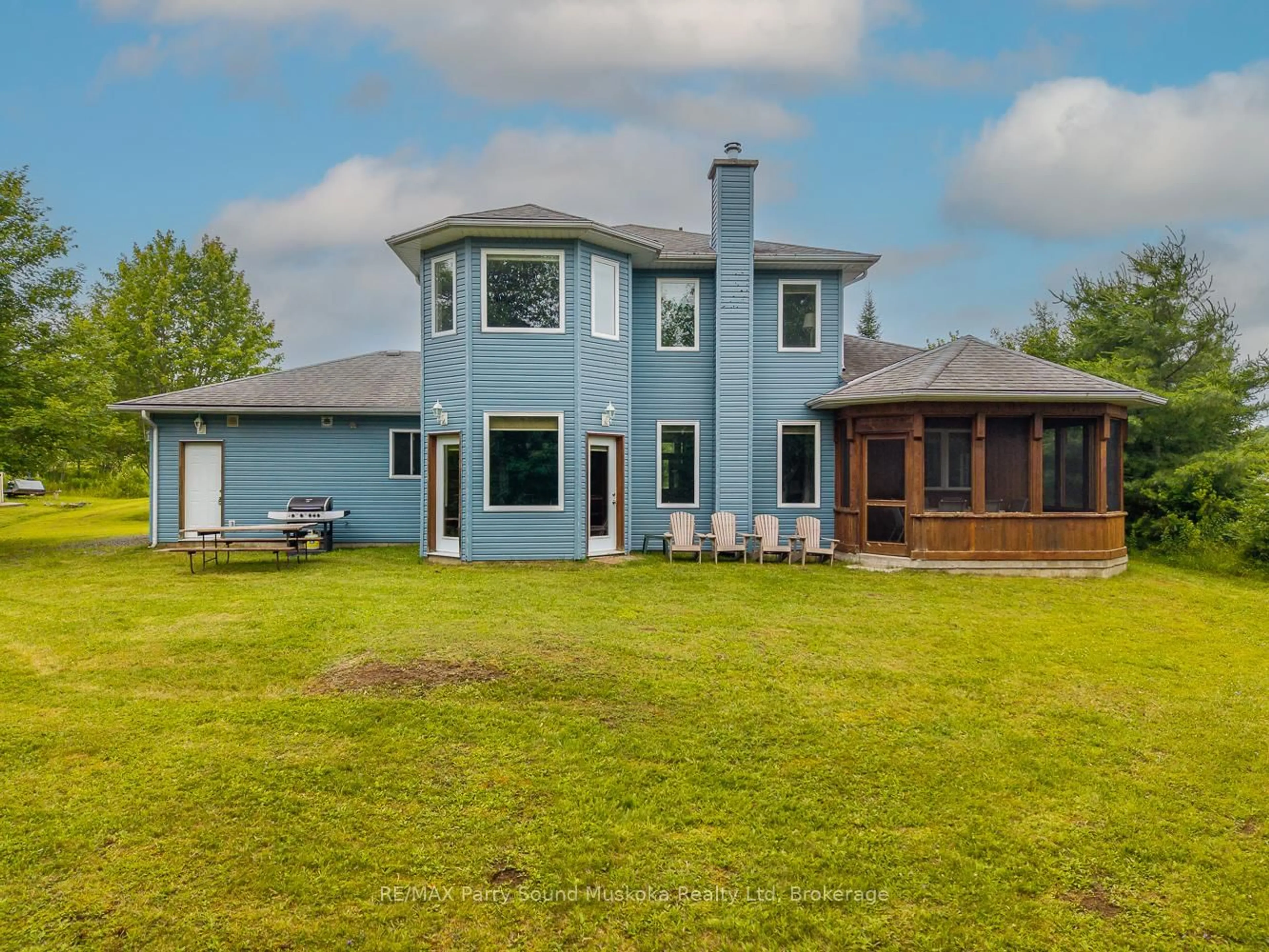 A pic from outside/outdoor area/front of a property/back of a property/a pic from drone, water/lake/river/ocean view for 25 Cole Point Tr, McKellar Ontario P2A 0B4