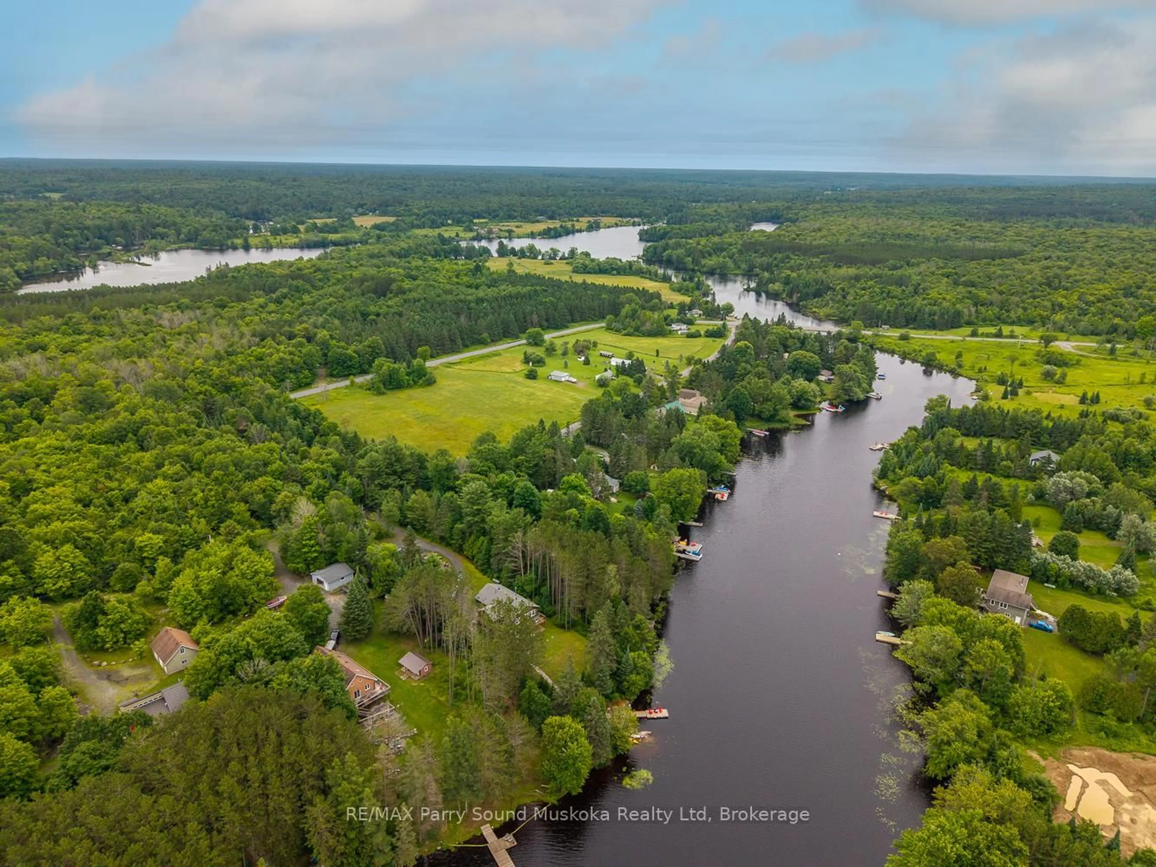A pic from outside/outdoor area/front of a property/back of a property/a pic from drone, water/lake/river/ocean view for 25 Cole Point Tr, McKellar Ontario P2A 0B4