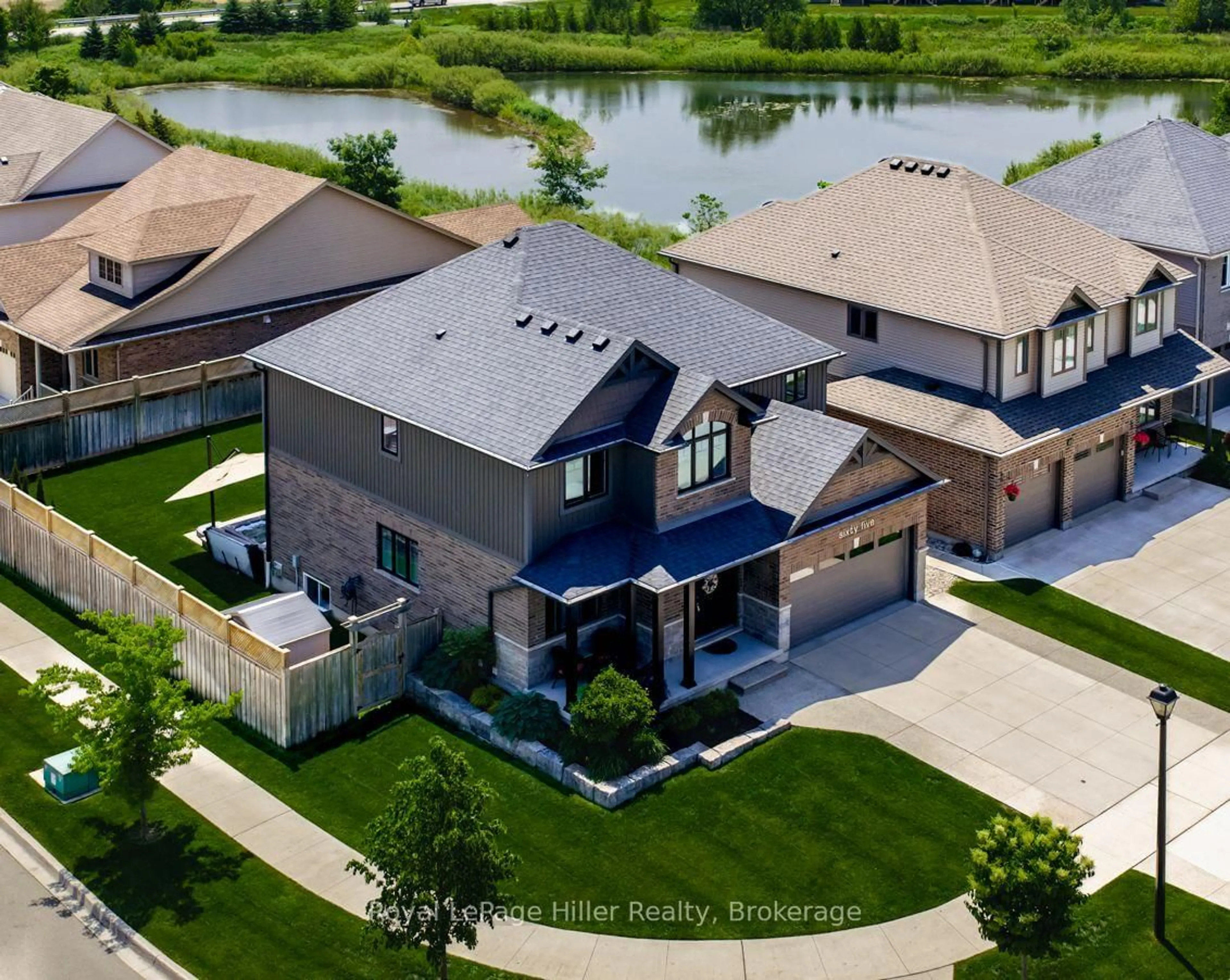 A pic from outside/outdoor area/front of a property/back of a property/a pic from drone, water/lake/river/ocean view for 65 Thomas St, Stratford Ontario N5A 0B9