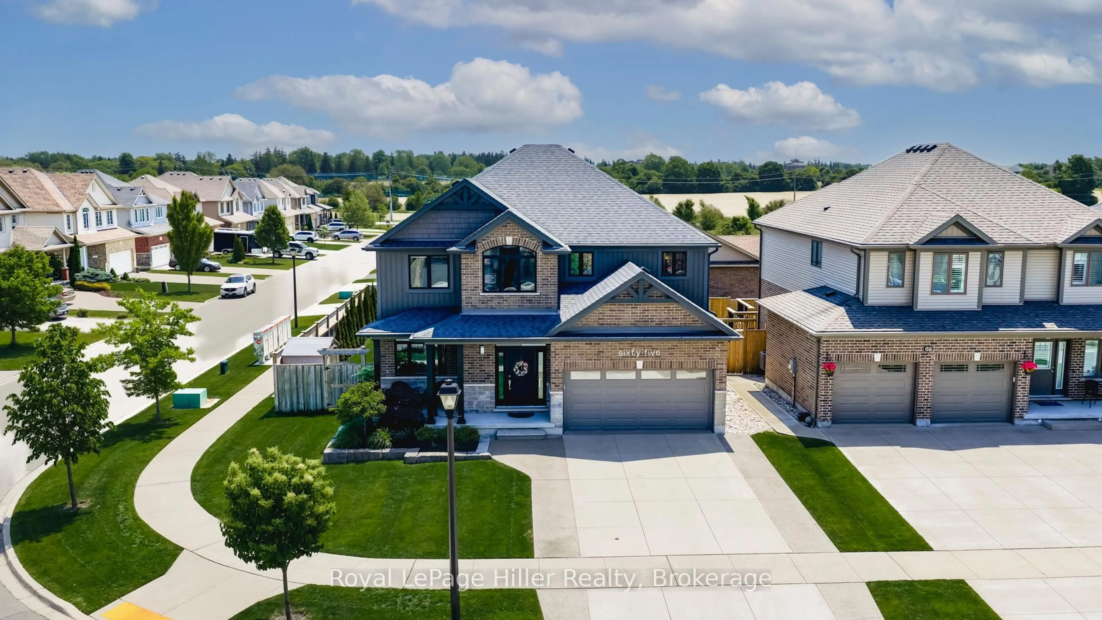 A pic from outside/outdoor area/front of a property/back of a property/a pic from drone, street for 65 Thomas St, Stratford Ontario N5A 0B9