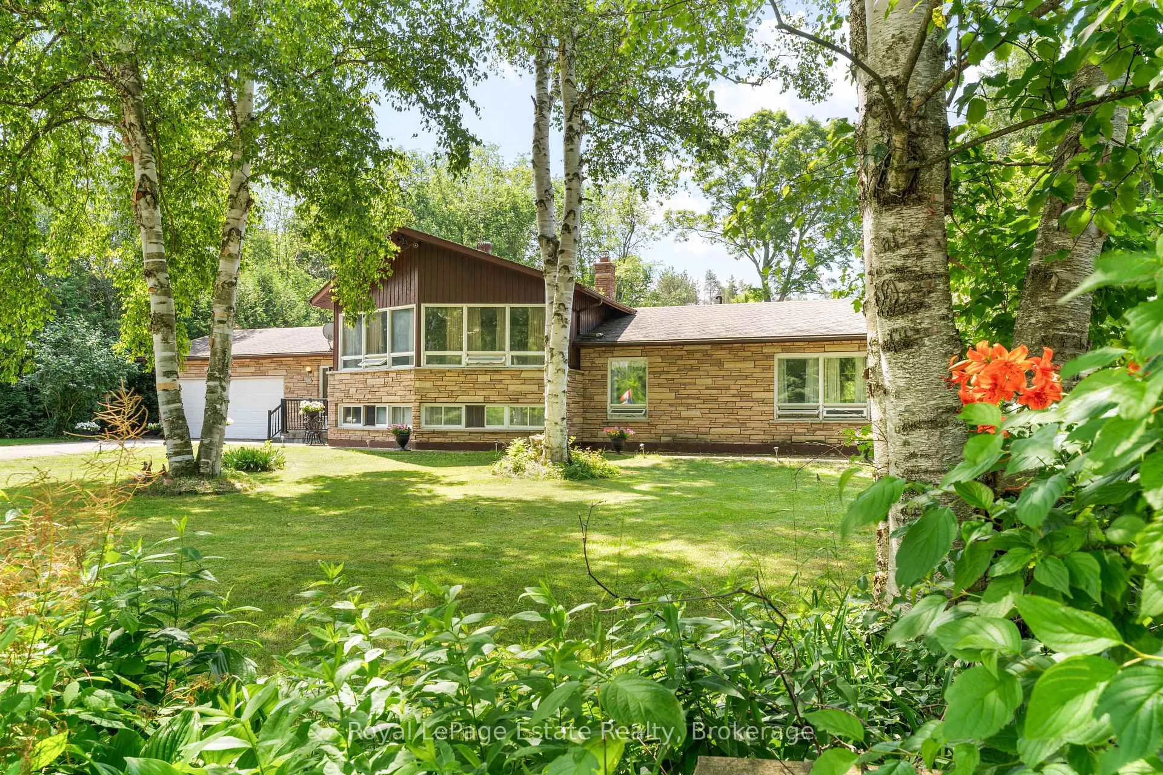 A pic from outside/outdoor area/front of a property/back of a property/a pic from drone, unknown for 97 Dorena Cres, South Bruce Peninsula Ontario N0H 2G0