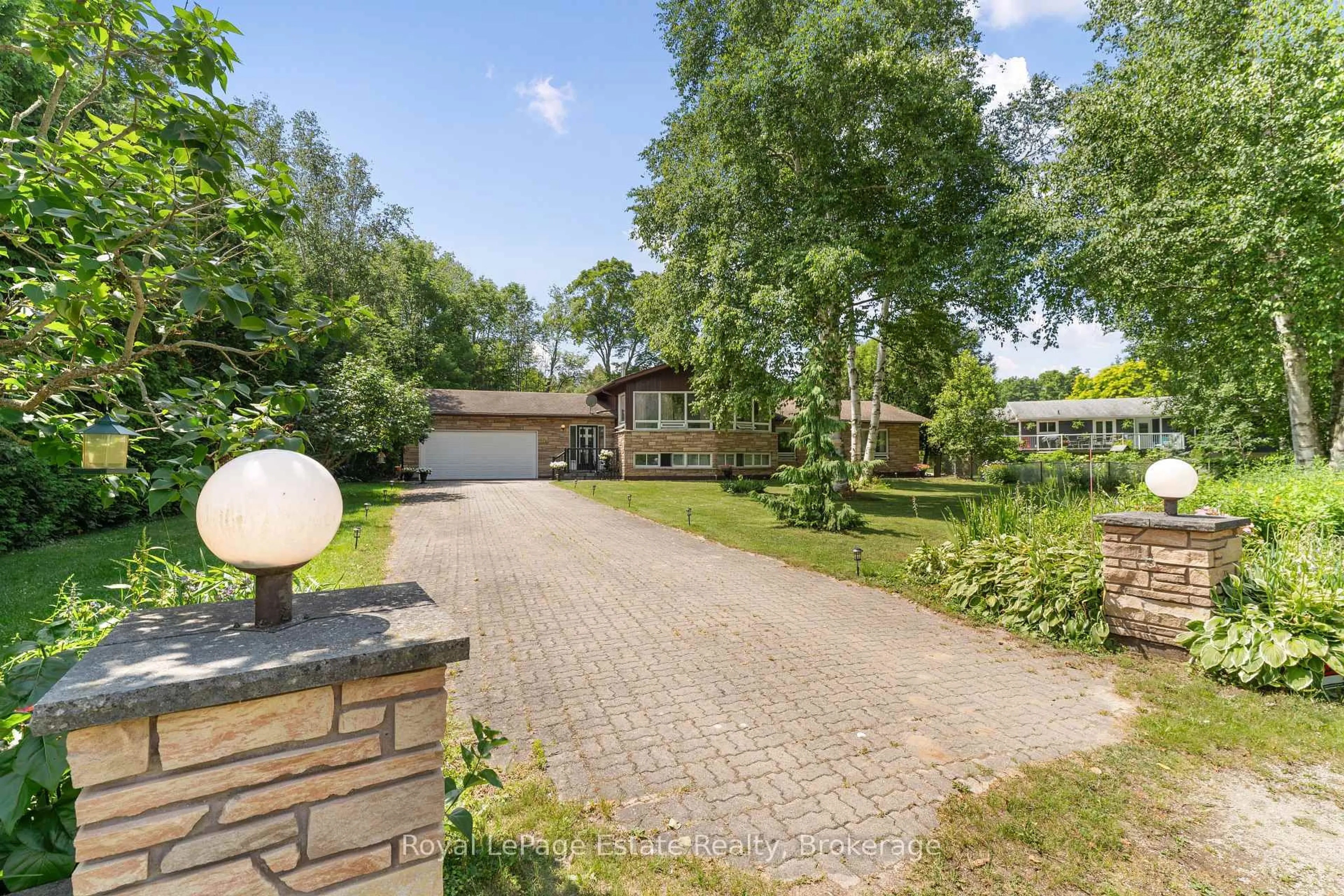 A pic from outside/outdoor area/front of a property/back of a property/a pic from drone, street for 97 Dorena Cres, South Bruce Peninsula Ontario N0H 2G0