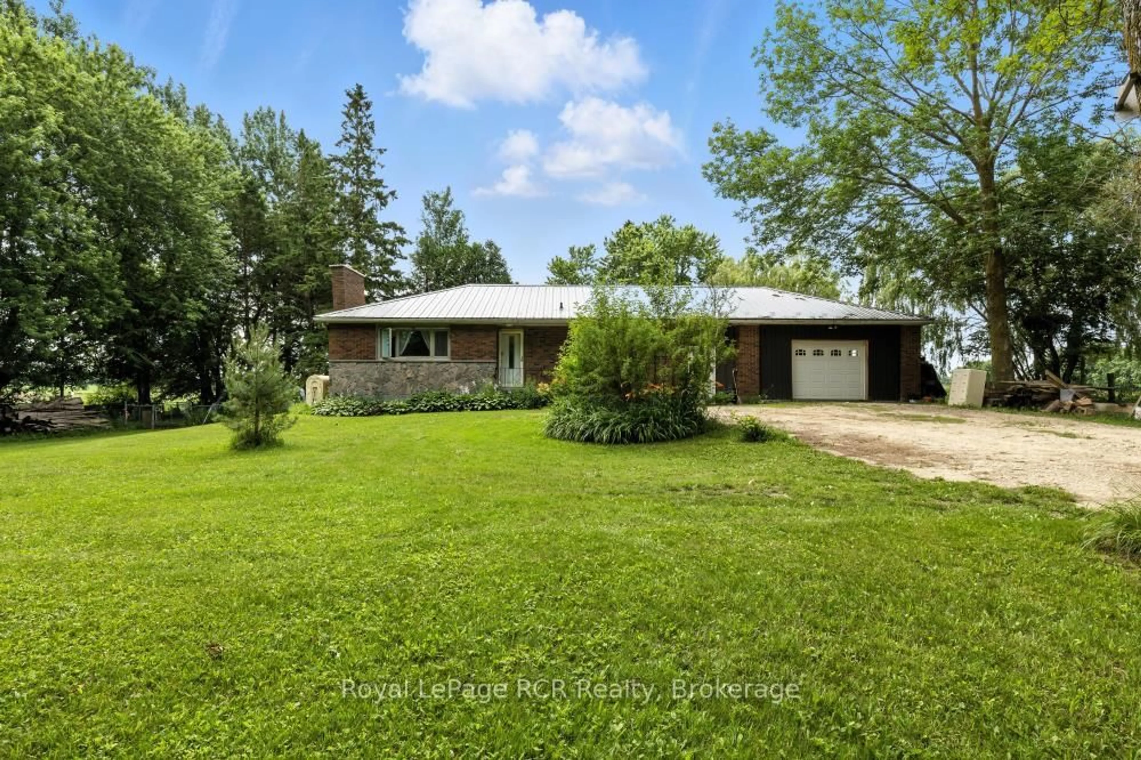 A pic from outside/outdoor area/front of a property/back of a property/a pic from drone, street for 185234 Grey Road 9, Southgate Ontario N0C 1B0