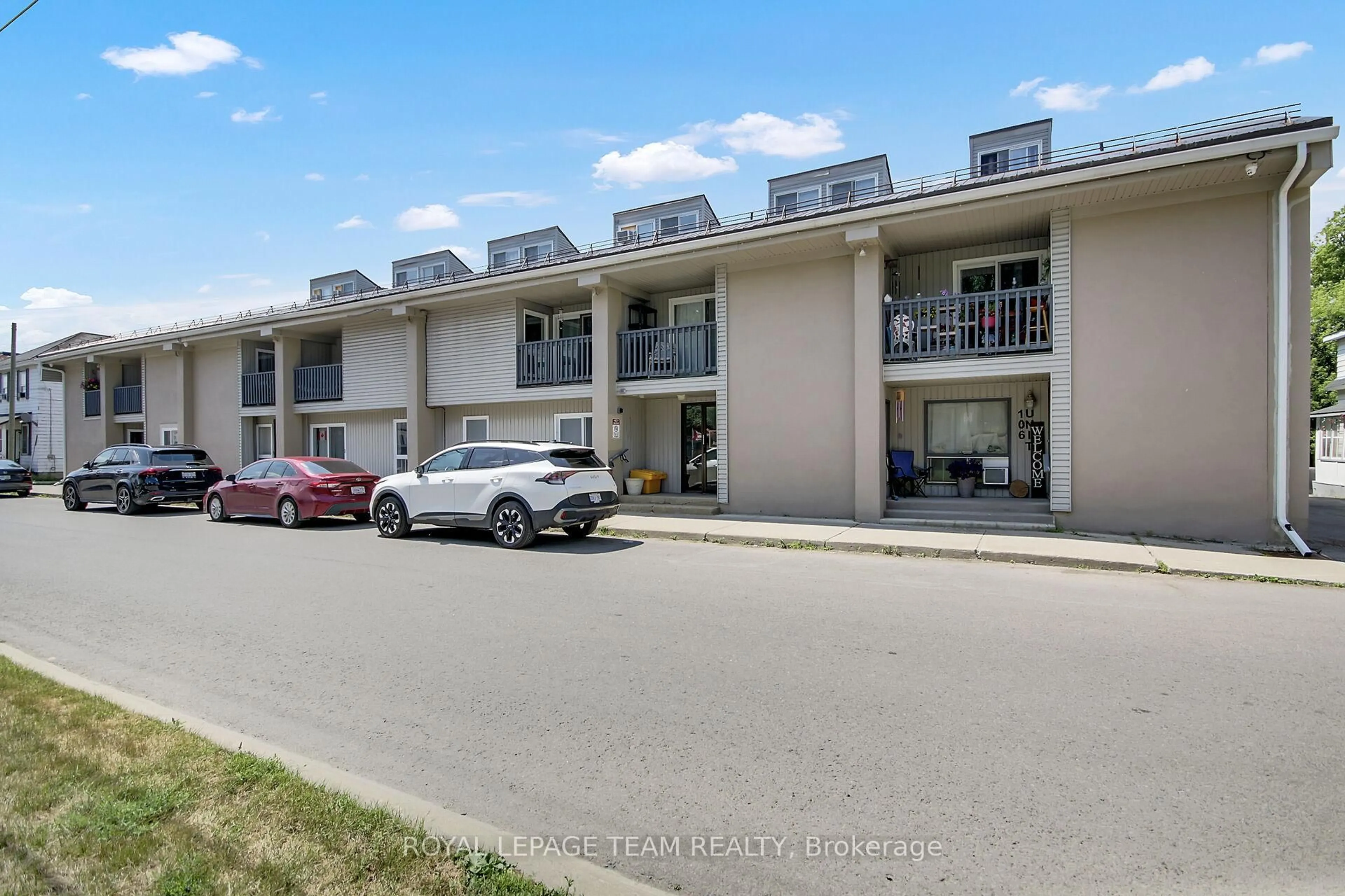 A pic from outside/outdoor area/front of a property/back of a property/a pic from drone, unknown for 105 Asa St #104, North Grenville Ontario K0G 1J0