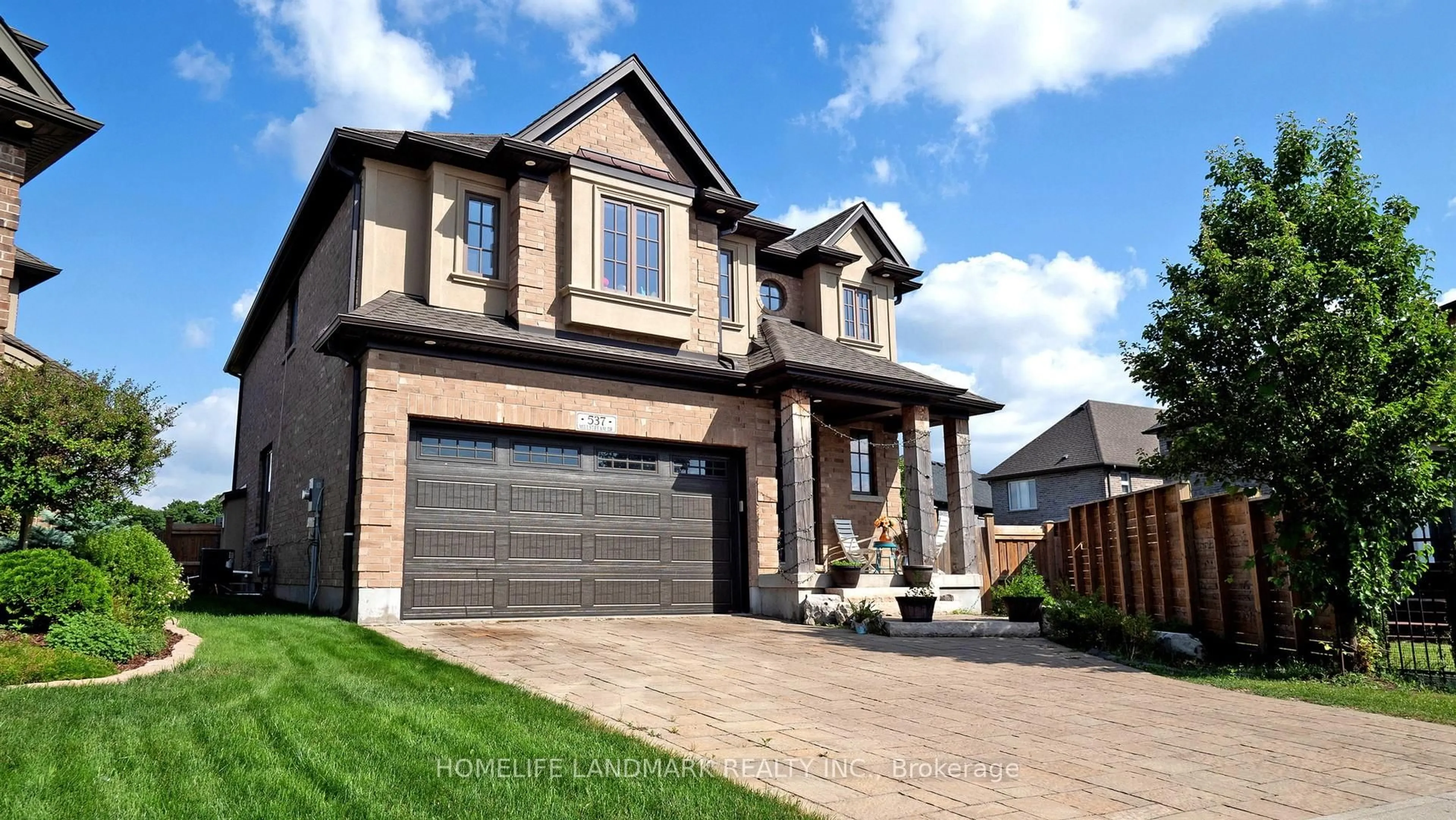 Home with brick exterior material, street for 537 Millstream Dr, Waterloo Ontario N2K 0E2
