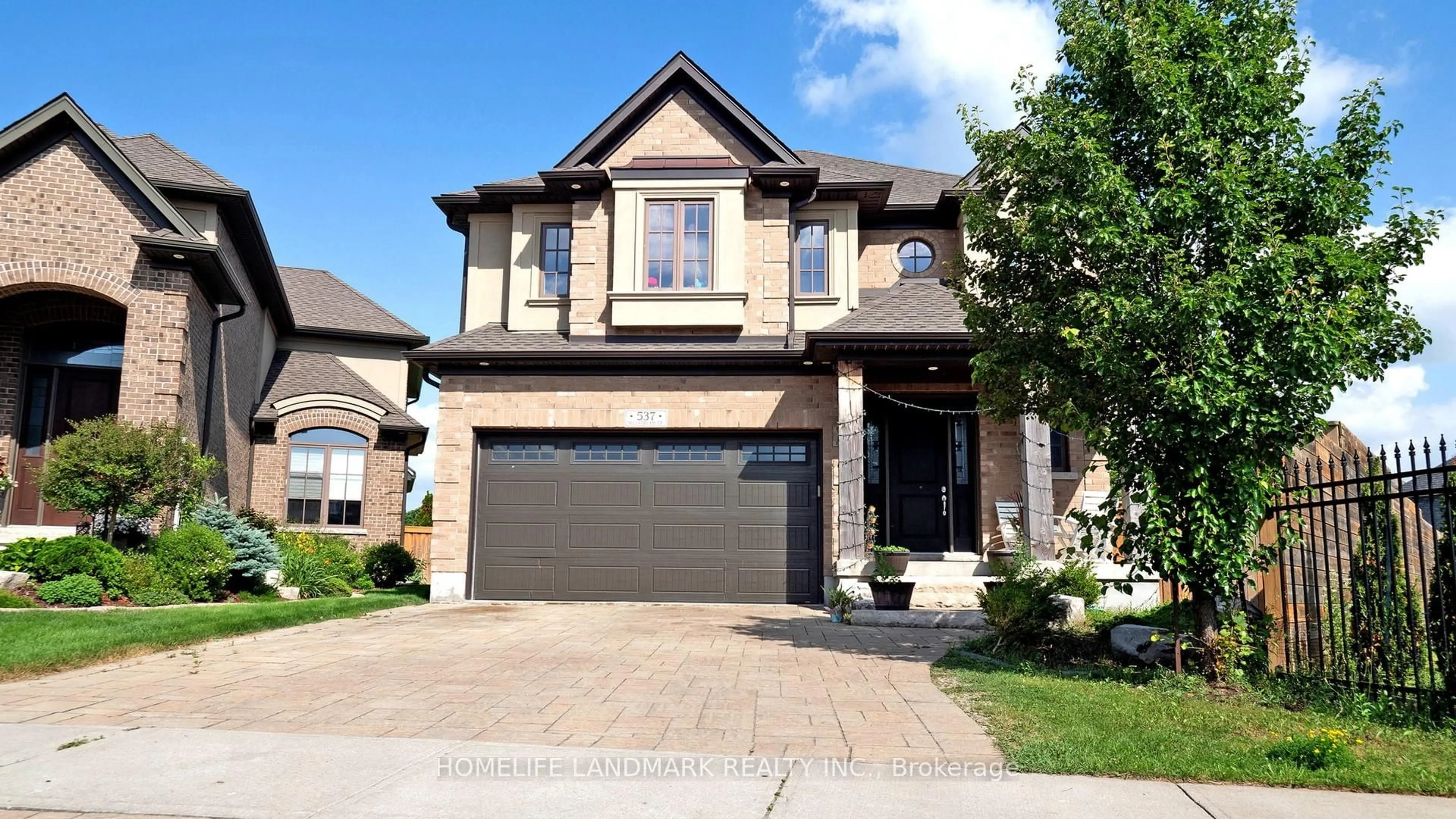 Home with brick exterior material, street for 537 Millstream Dr, Waterloo Ontario N2K 0E2