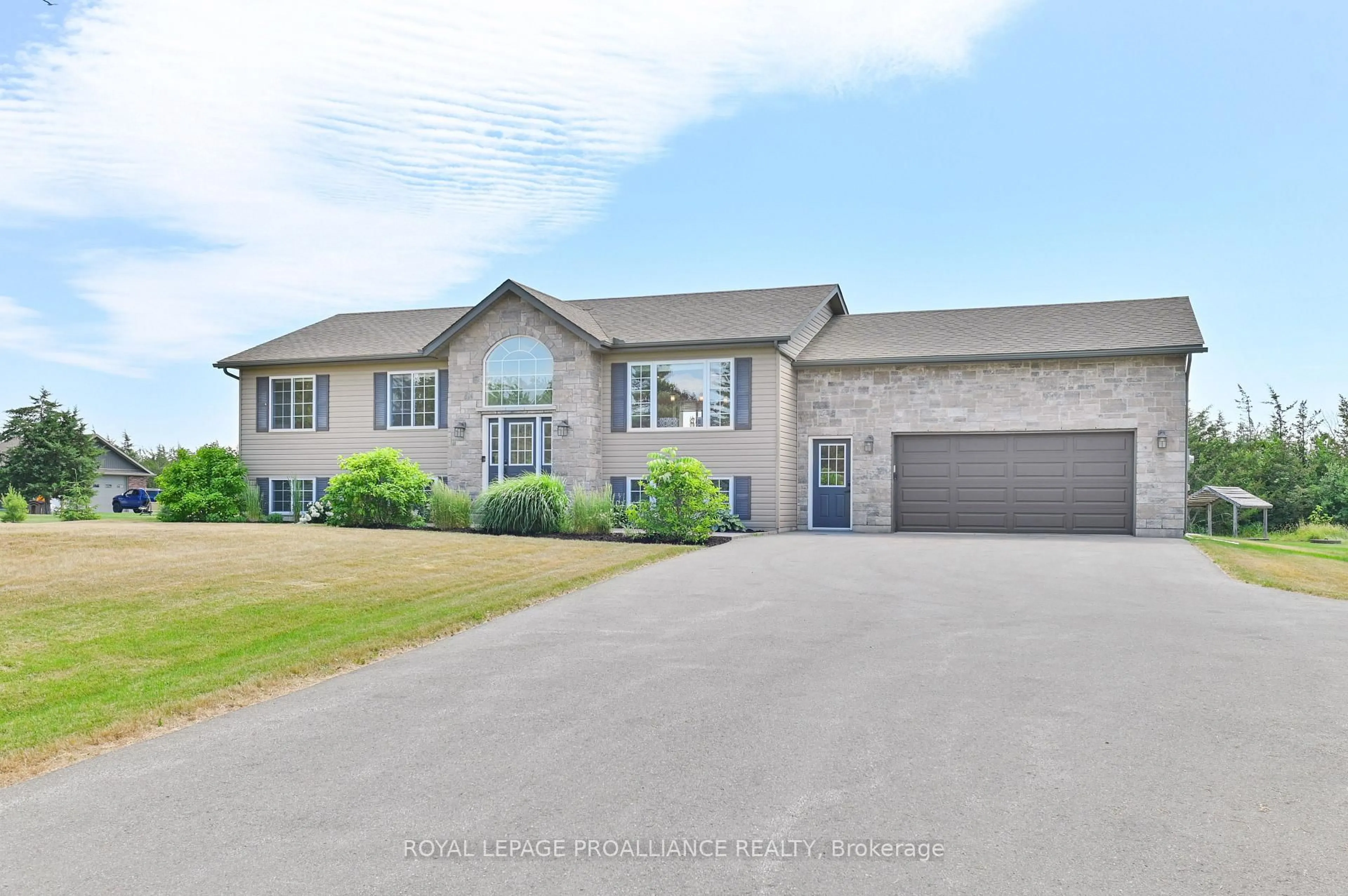 Home with vinyl exterior material, street for 3471 County 3 Rd, Prince Edward County Ontario K0K 1L0