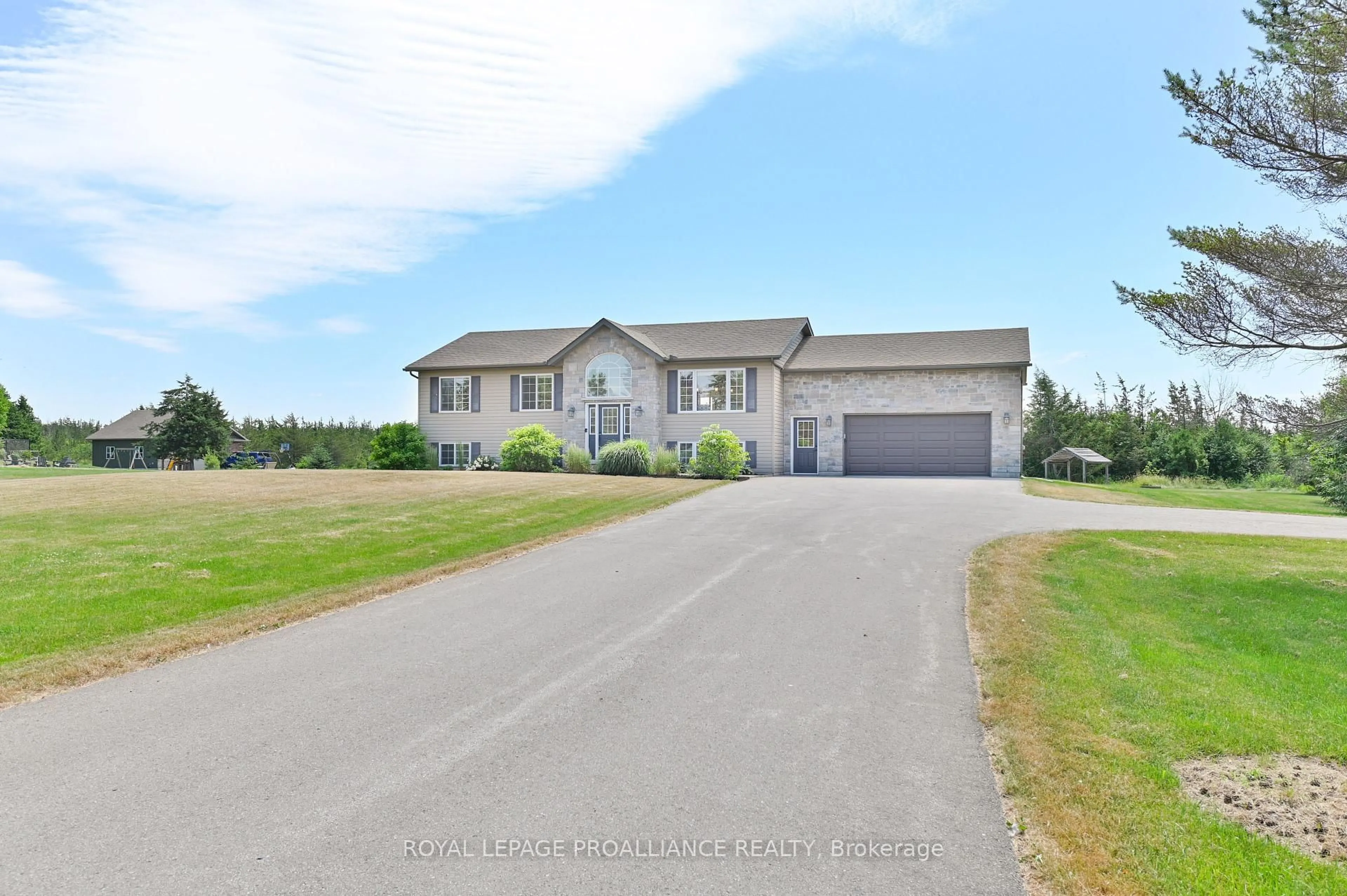 A pic from outside/outdoor area/front of a property/back of a property/a pic from drone, unknown for 3471 County 3 Rd, Prince Edward County Ontario K0K 1L0