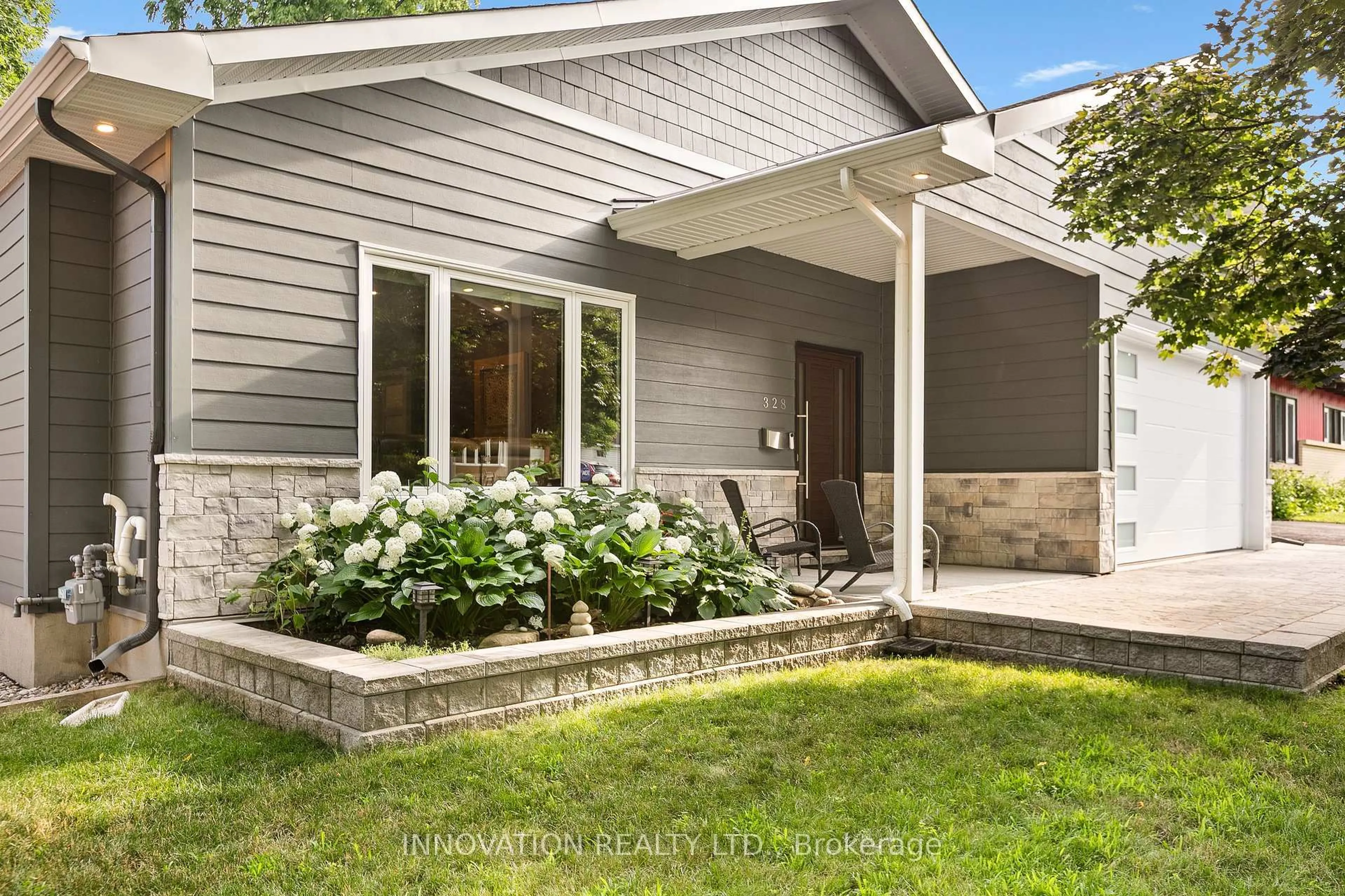 Home with vinyl exterior material, street for 328 Mountbatten Ave, Ottawa Ontario K1H 5W3