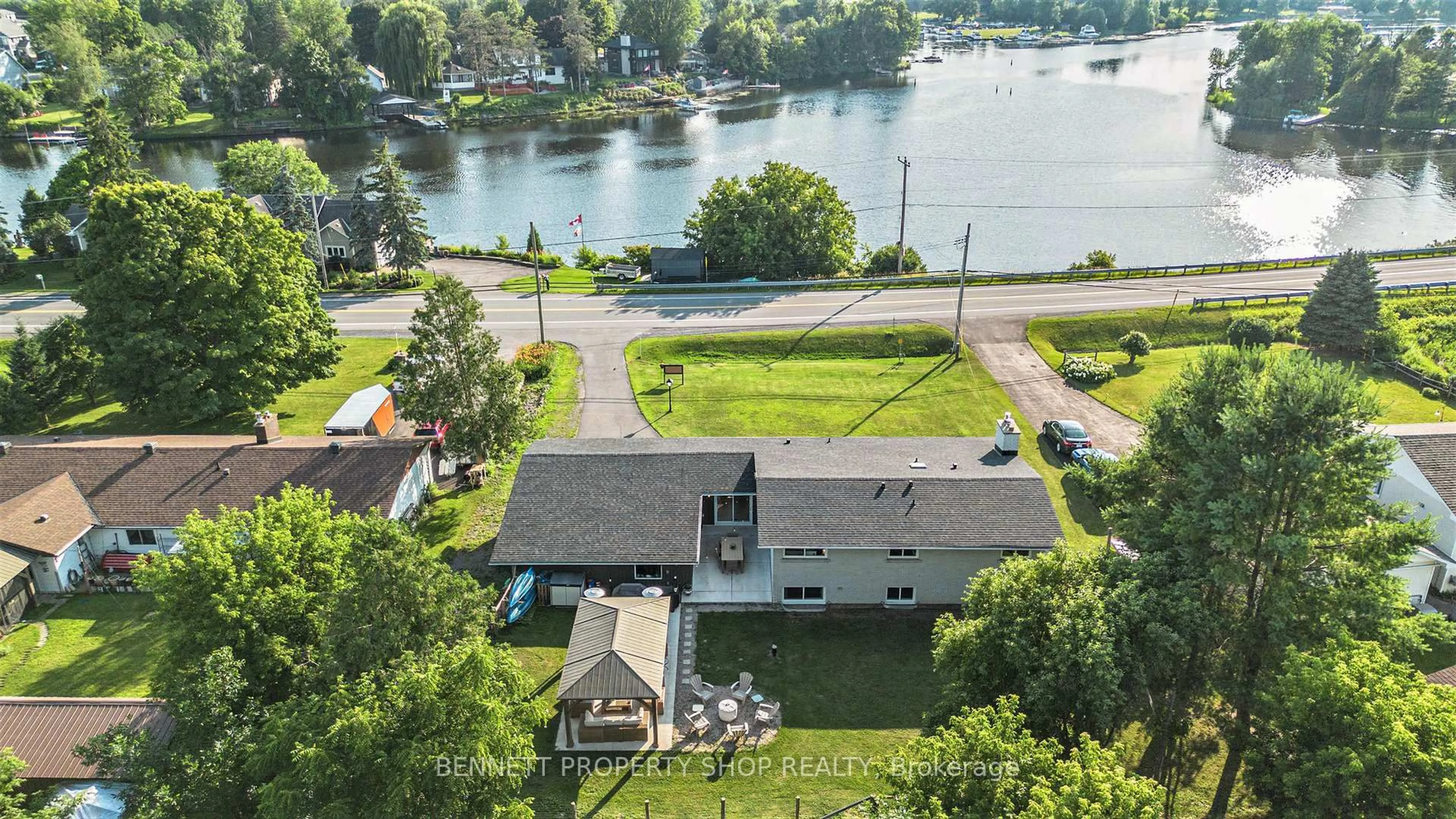 A pic from outside/outdoor area/front of a property/back of a property/a pic from drone, water/lake/river/ocean view for 1891 River Rd, Ottawa Ontario K4M 1B4