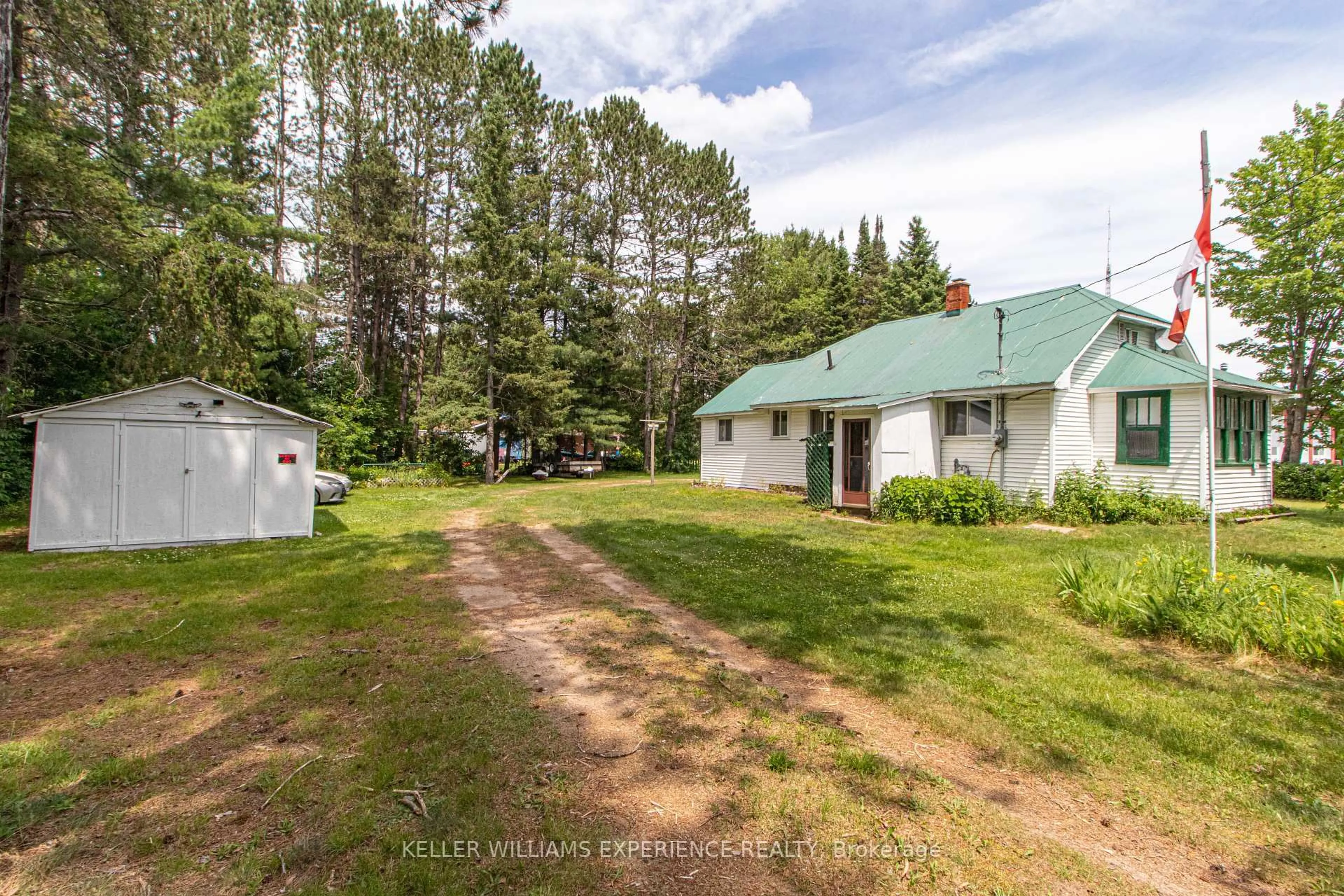 A pic from outside/outdoor area/front of a property/back of a property/a pic from drone, unknown for 152 Ottawa Ave, South River Ontario P0A 1X0