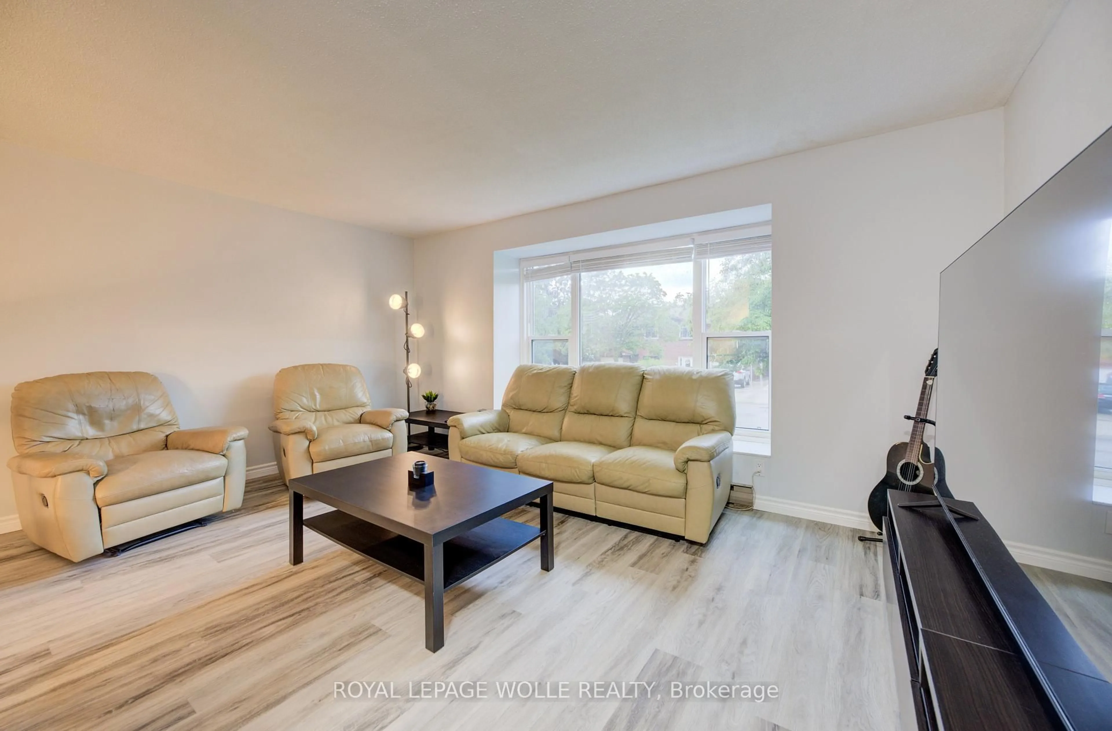 Living room with furniture, wood/laminate floor for 19 Hillbrook Cres, Kitchener Ontario N2N 1J4