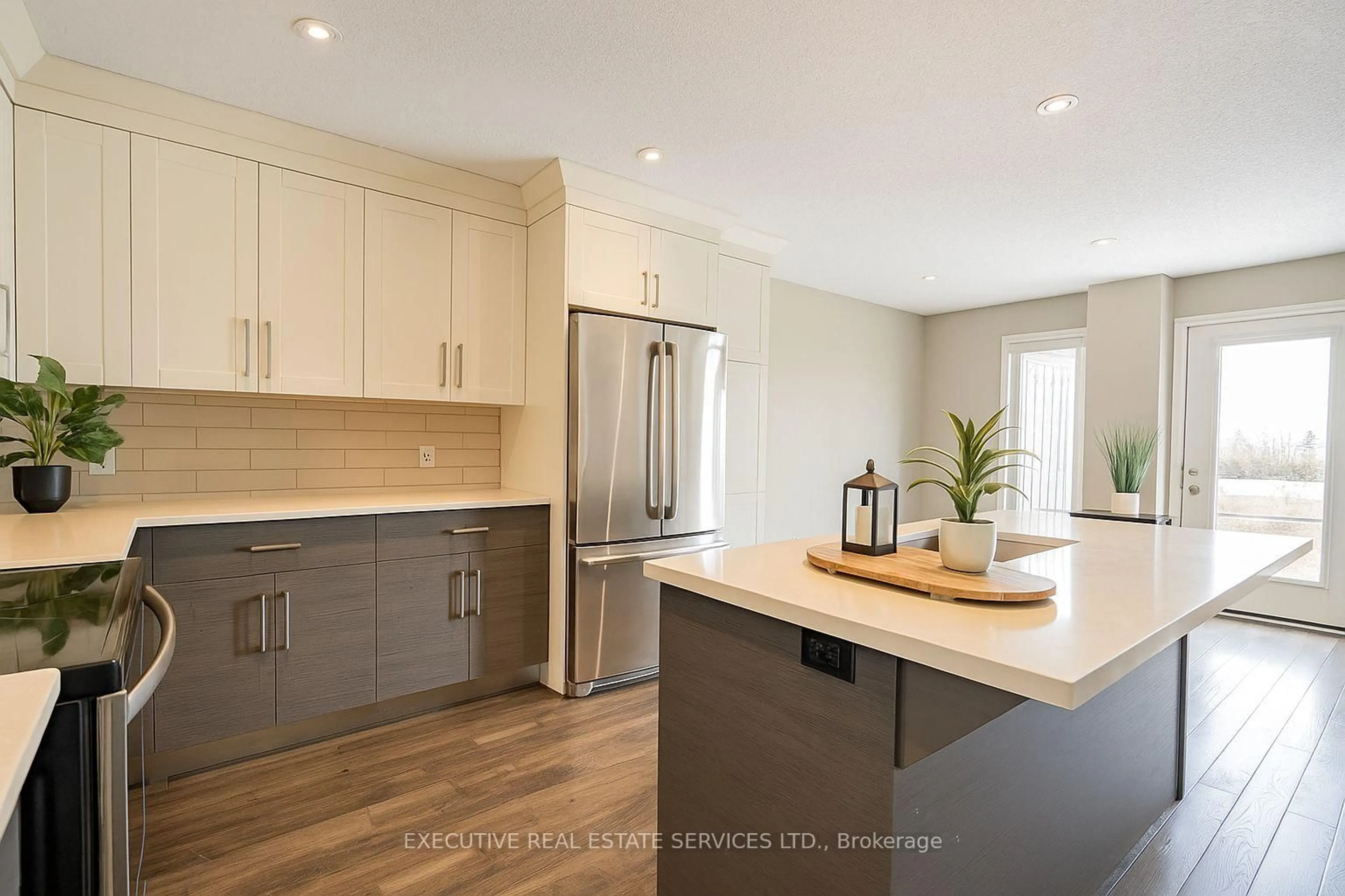 Open concept kitchen, wood/laminate floor for 153 FAIRFIELD Dr, Stratford Ontario N5A 6S2