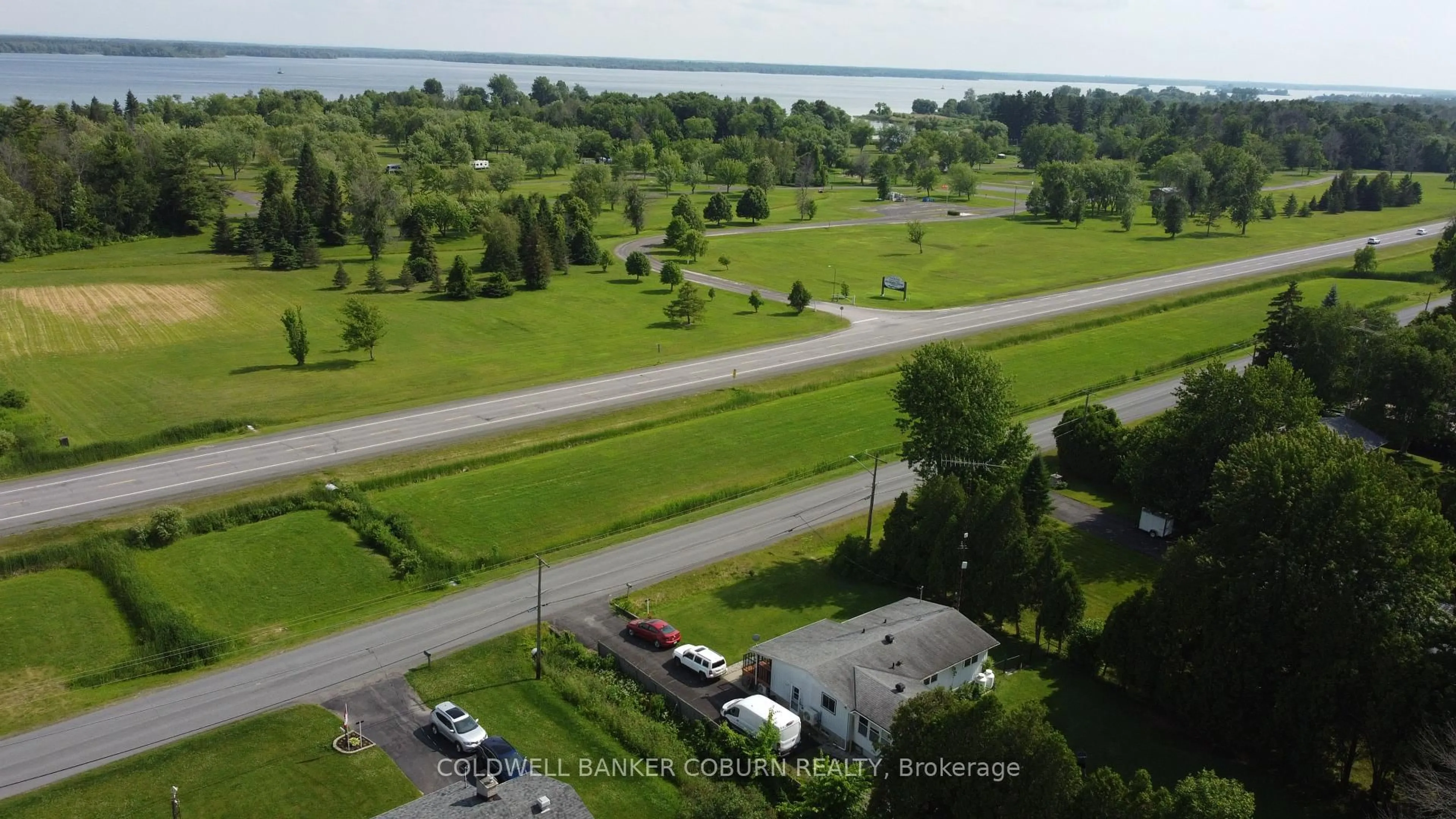 A pic from outside/outdoor area/front of a property/back of a property/a pic from drone, water/lake/river/ocean view for 13191 Riverside Dr, South Dundas Ontario K0C 1X0