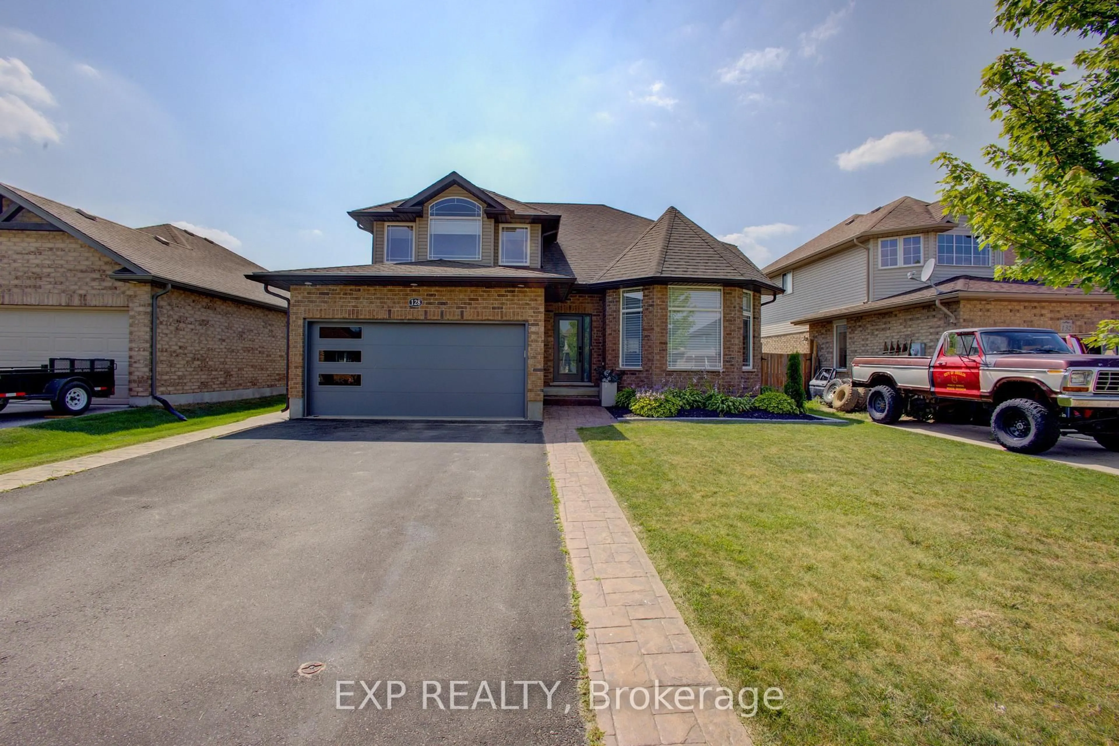 Home with brick exterior material, street for 128 Schmidt Dr, Wellington North Ontario N0G 1A0