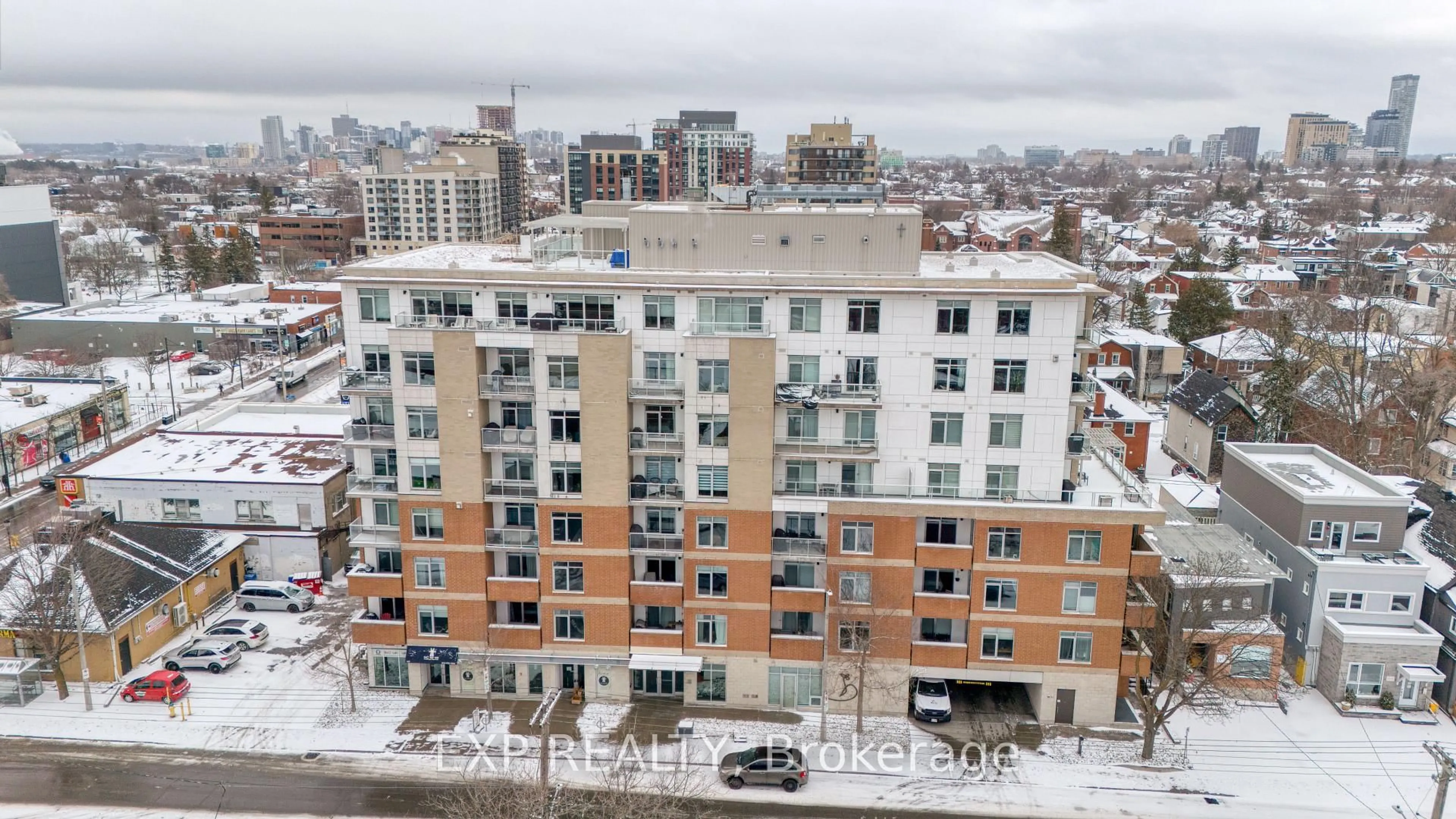 A pic from outside/outdoor area/front of a property/back of a property/a pic from drone, city buildings view from balcony for 131 Holland Ave #412, Ottawa Ontario K1Y 3A2
