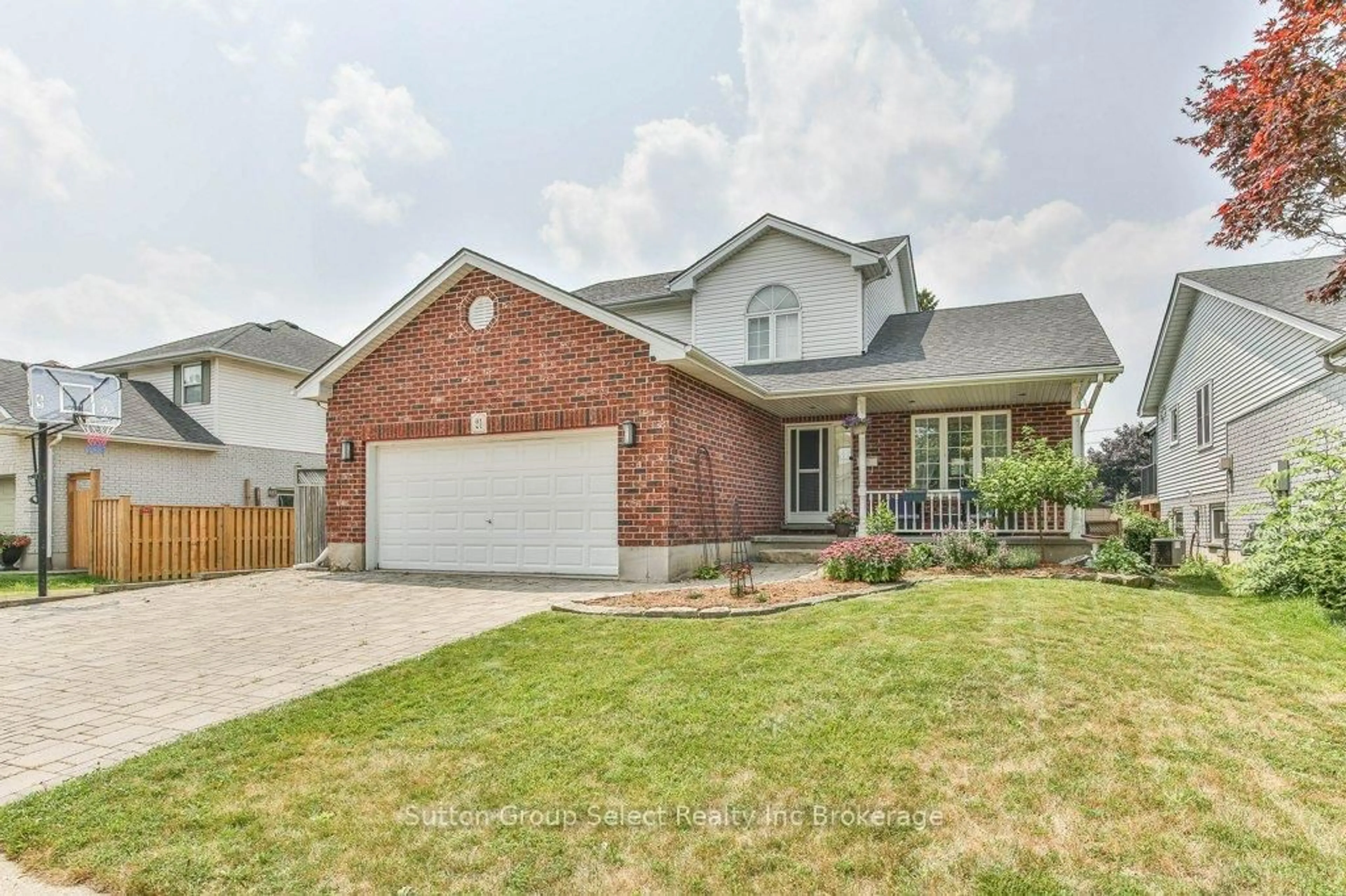 Home with brick exterior material, street for 21 Heron Ave, Woodstock Ontario N4T 1T1