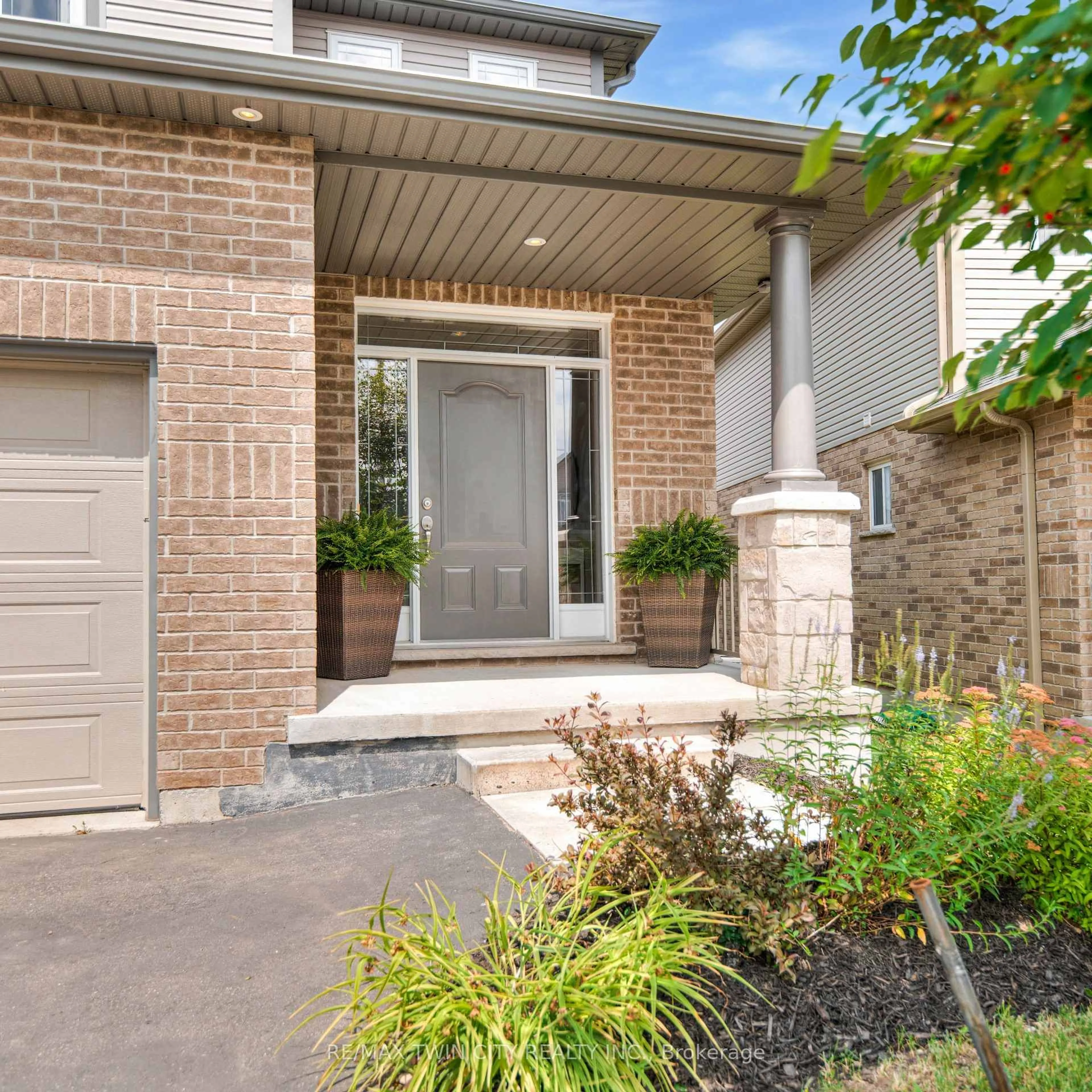 Home with brick exterior material, street for 455 Twinleaf St, Waterloo Ontario N2V 0B7