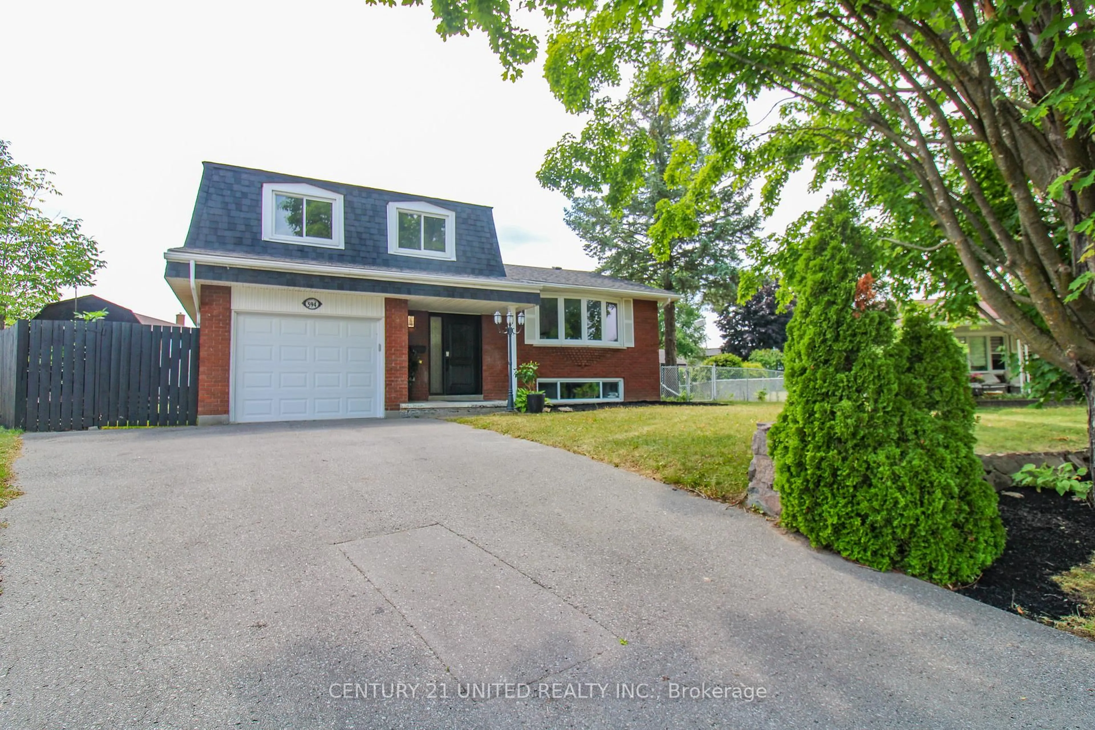 Home with brick exterior material, street for 594 Saugeen Cres, Peterborough South Ontario K9J 1K1