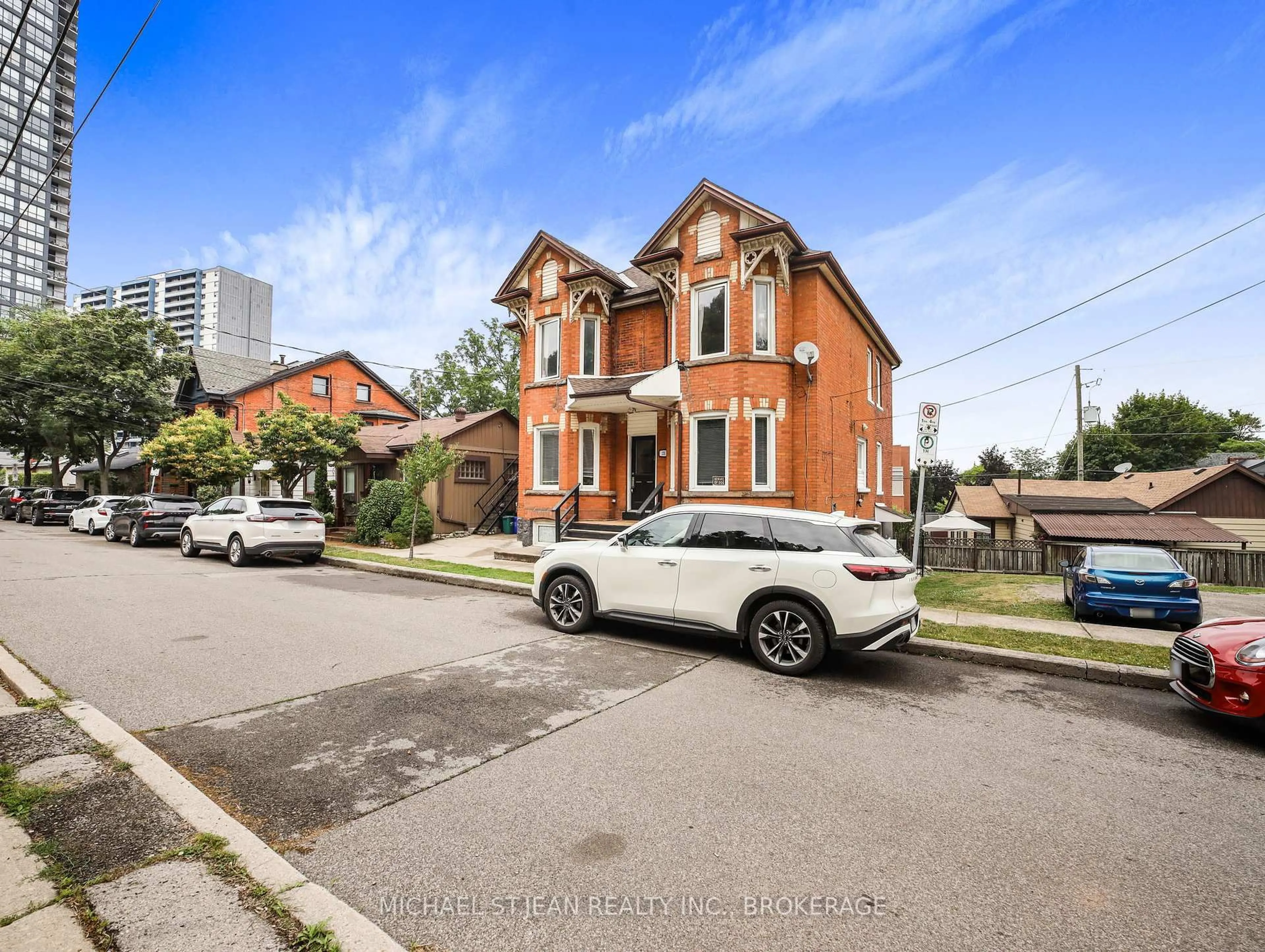 Home with brick exterior material, street for 21 Foster St, Hamilton Ontario L8N 1Z7
